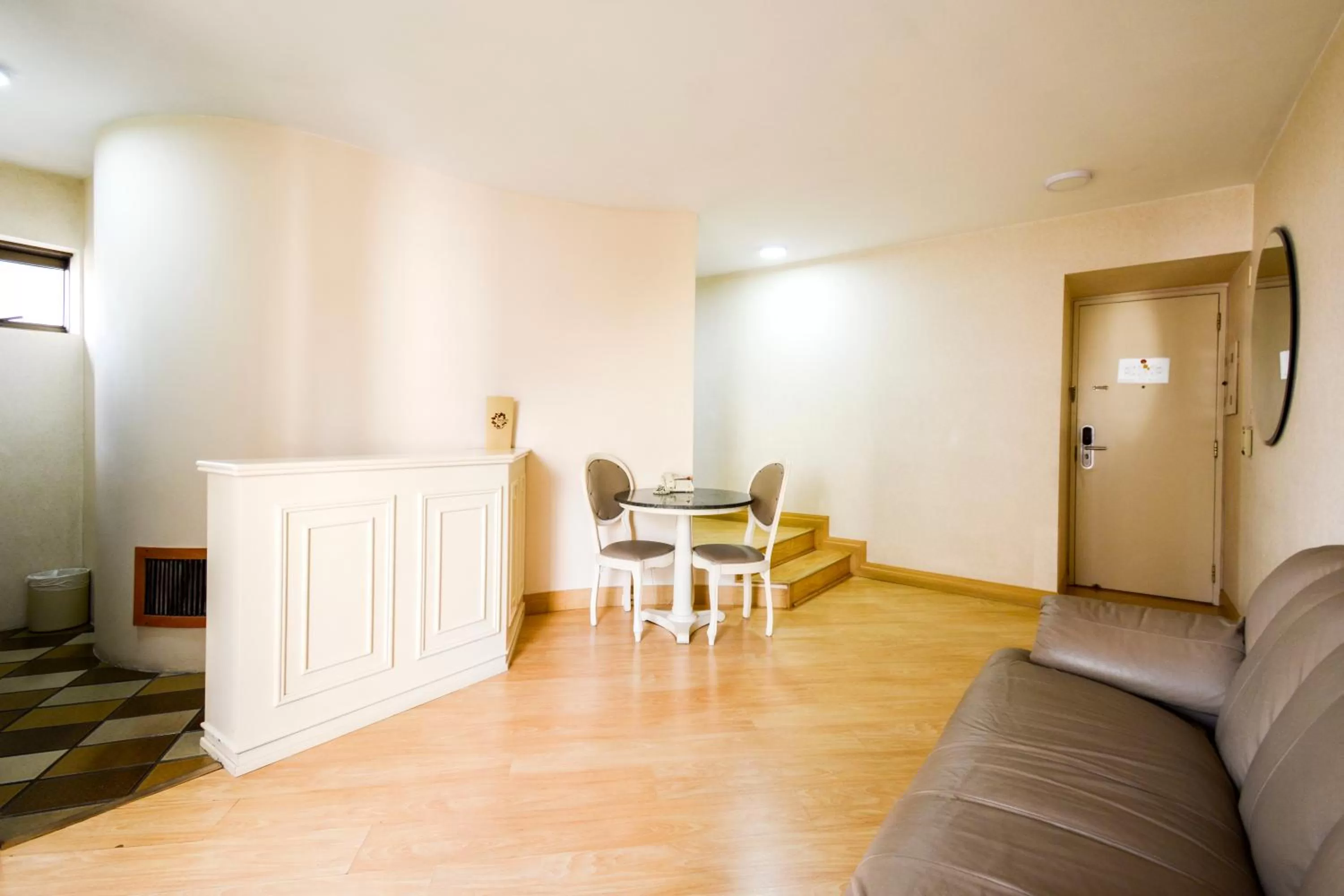 Living room, Seating Area in Wall Street Apartments by BnbHost