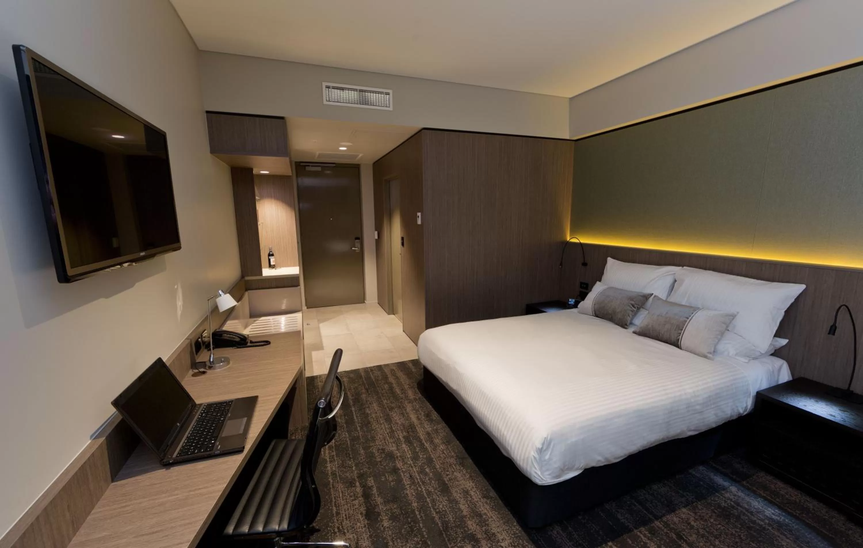 Photo of the whole room, Bed in The Glen Hotel and Suites