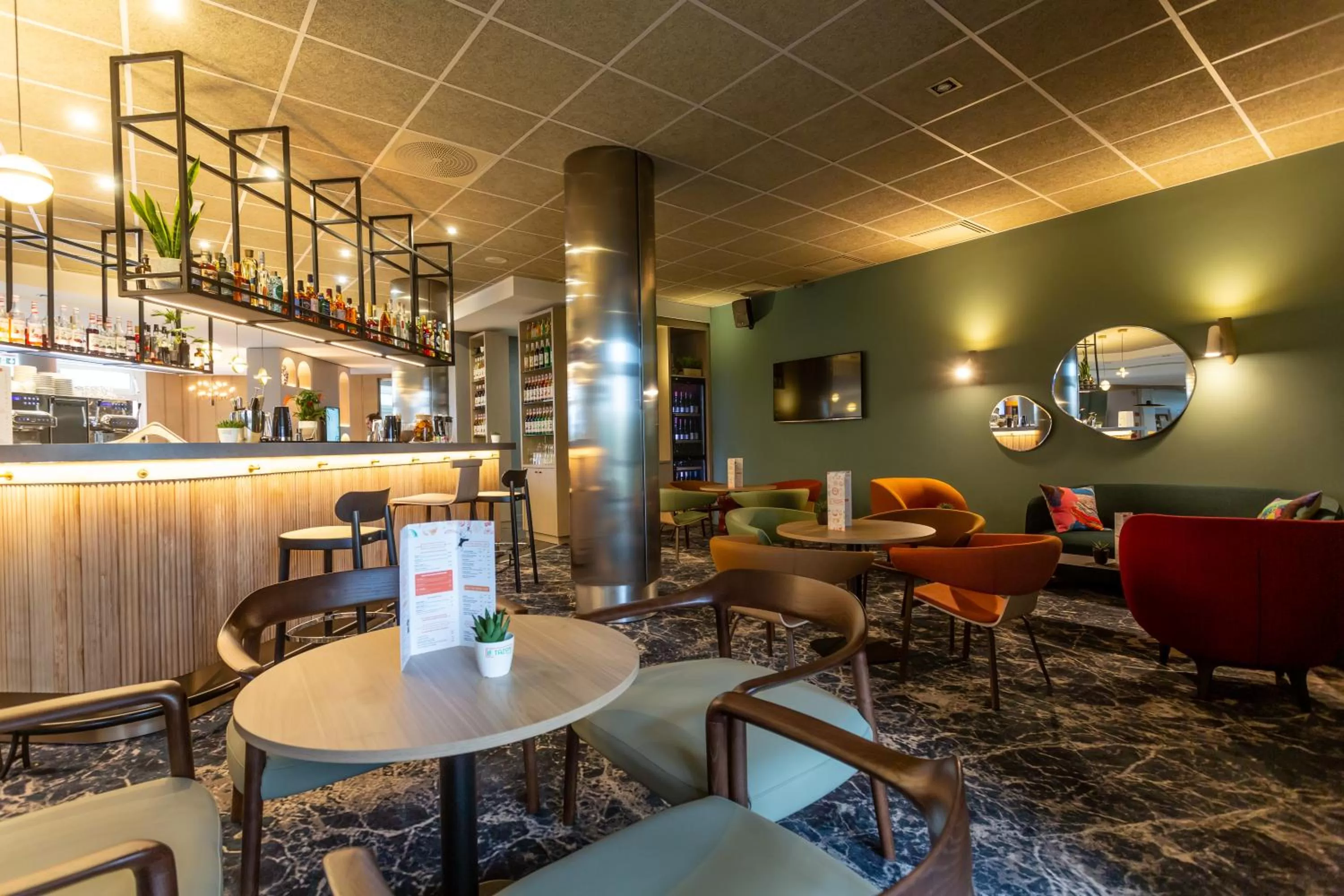 Lounge or bar in Novotel Bourges