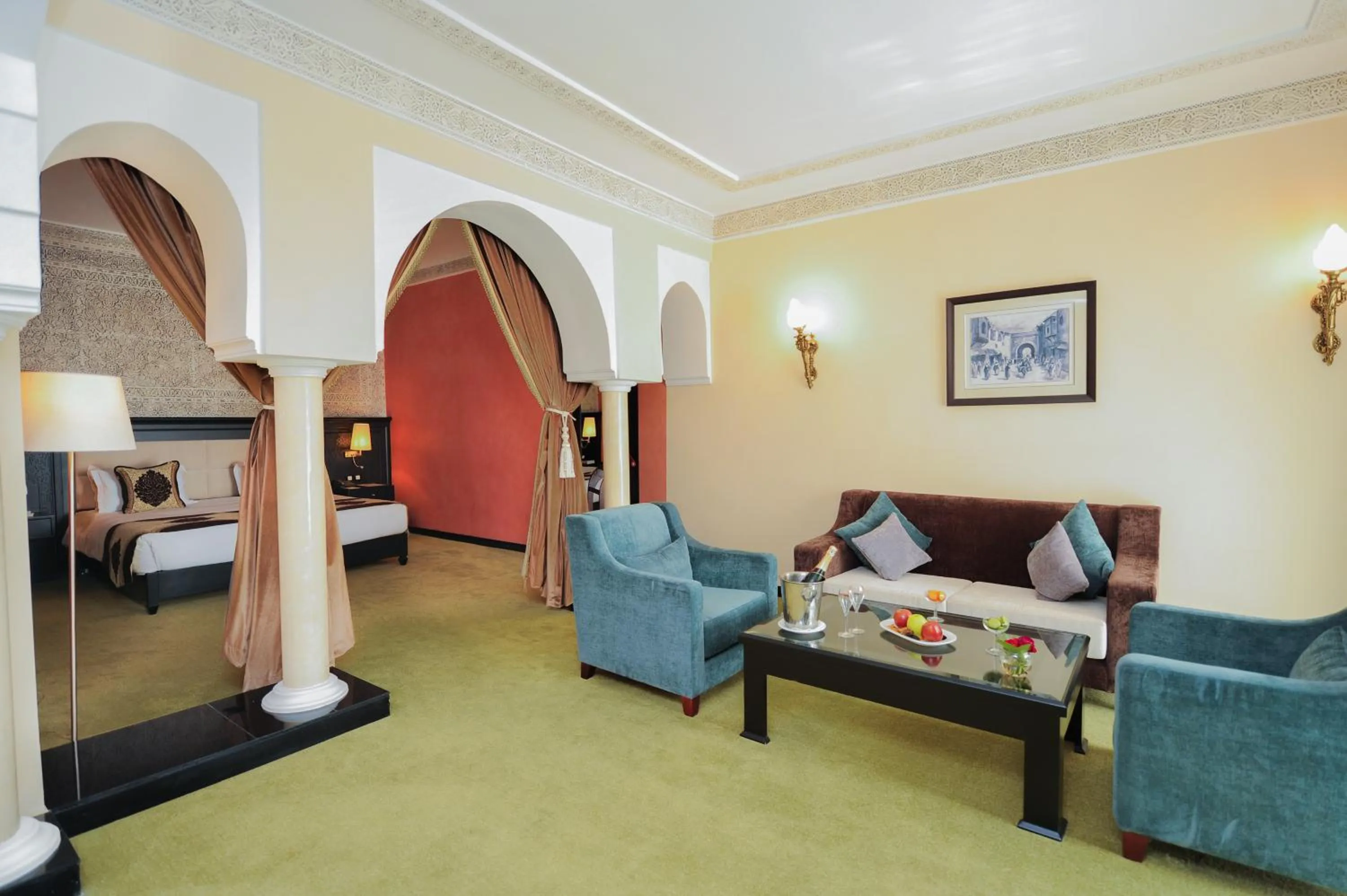 Seating area, Bed in Ennakhil Marrakech Hotel & SPA