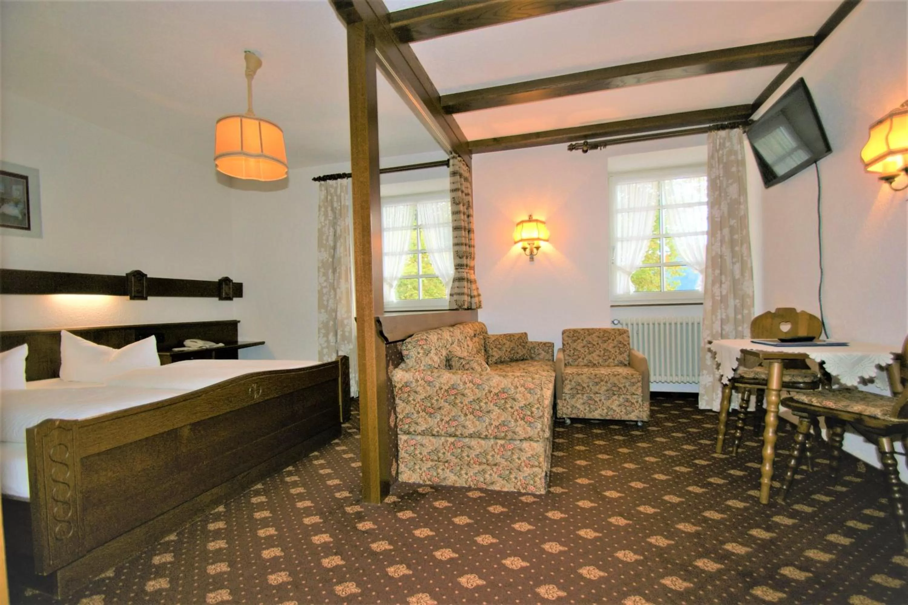 Photo of the whole room, Bed in ZUR TRAUBE Schwarzwaldhotel & Restaurant am Titisee