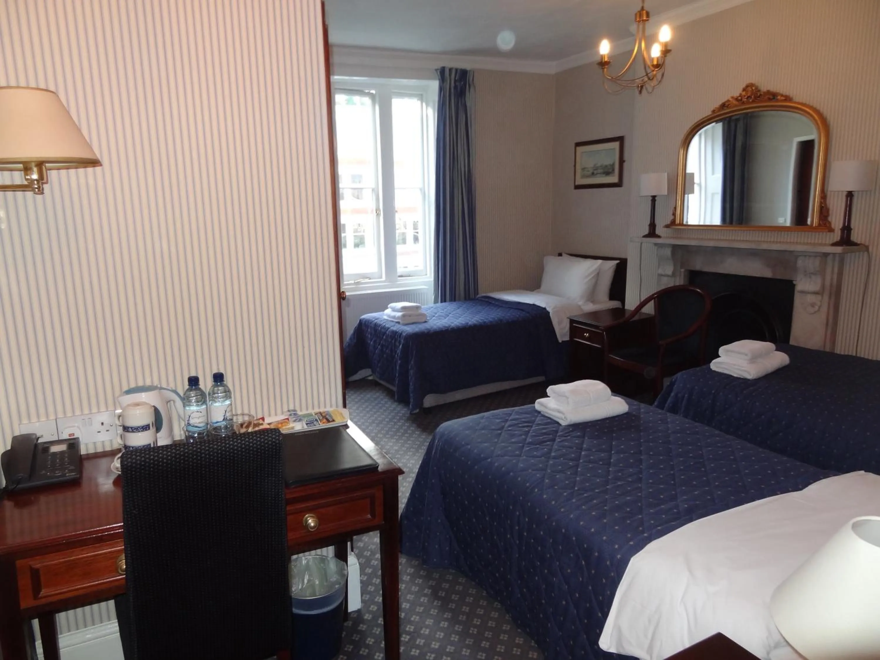 Bed in Regency House Hotel