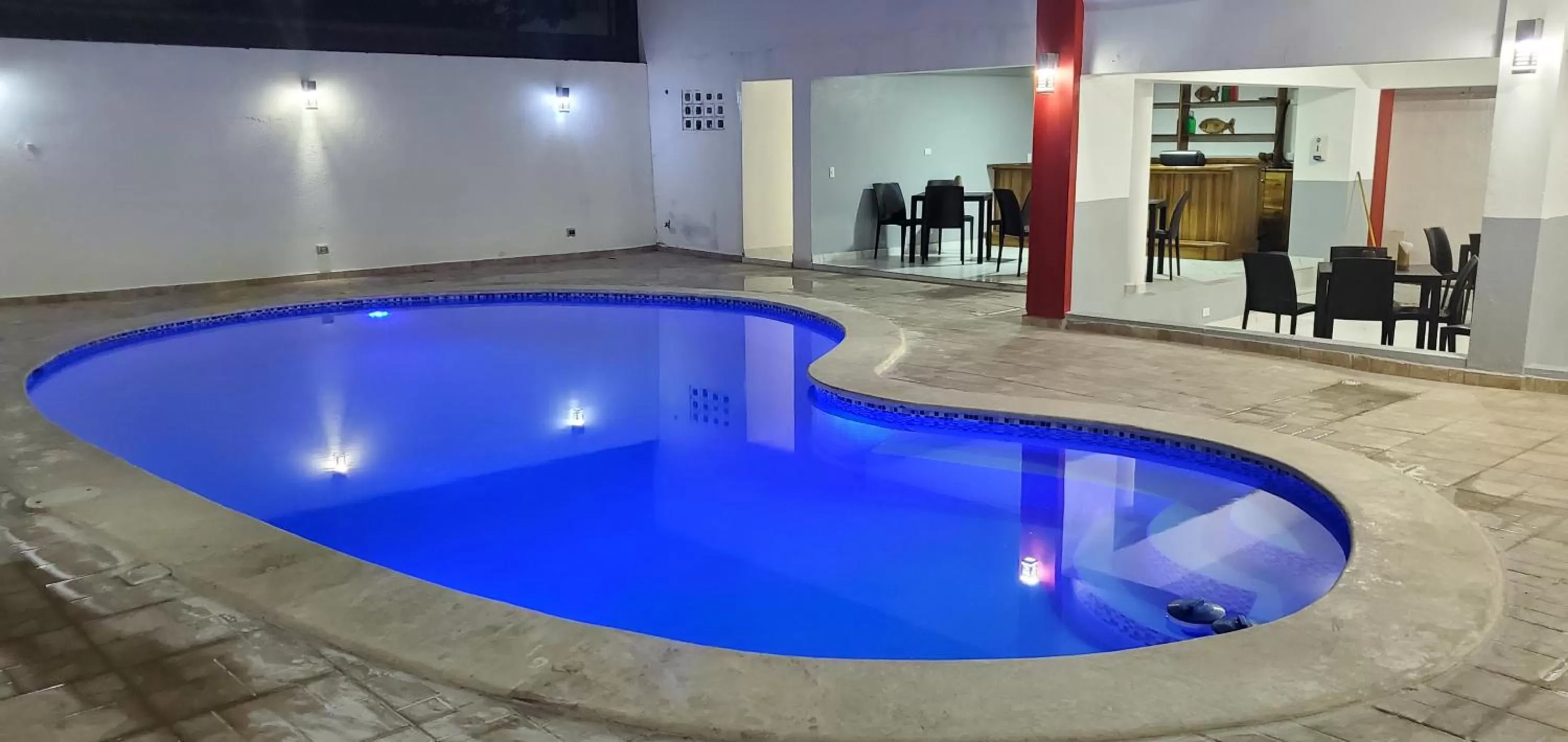 Swimming pool in Boca Grande Hotel Suites