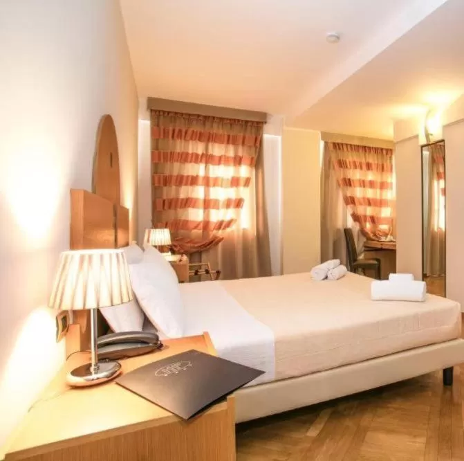 Bed in Hotel PentHouse