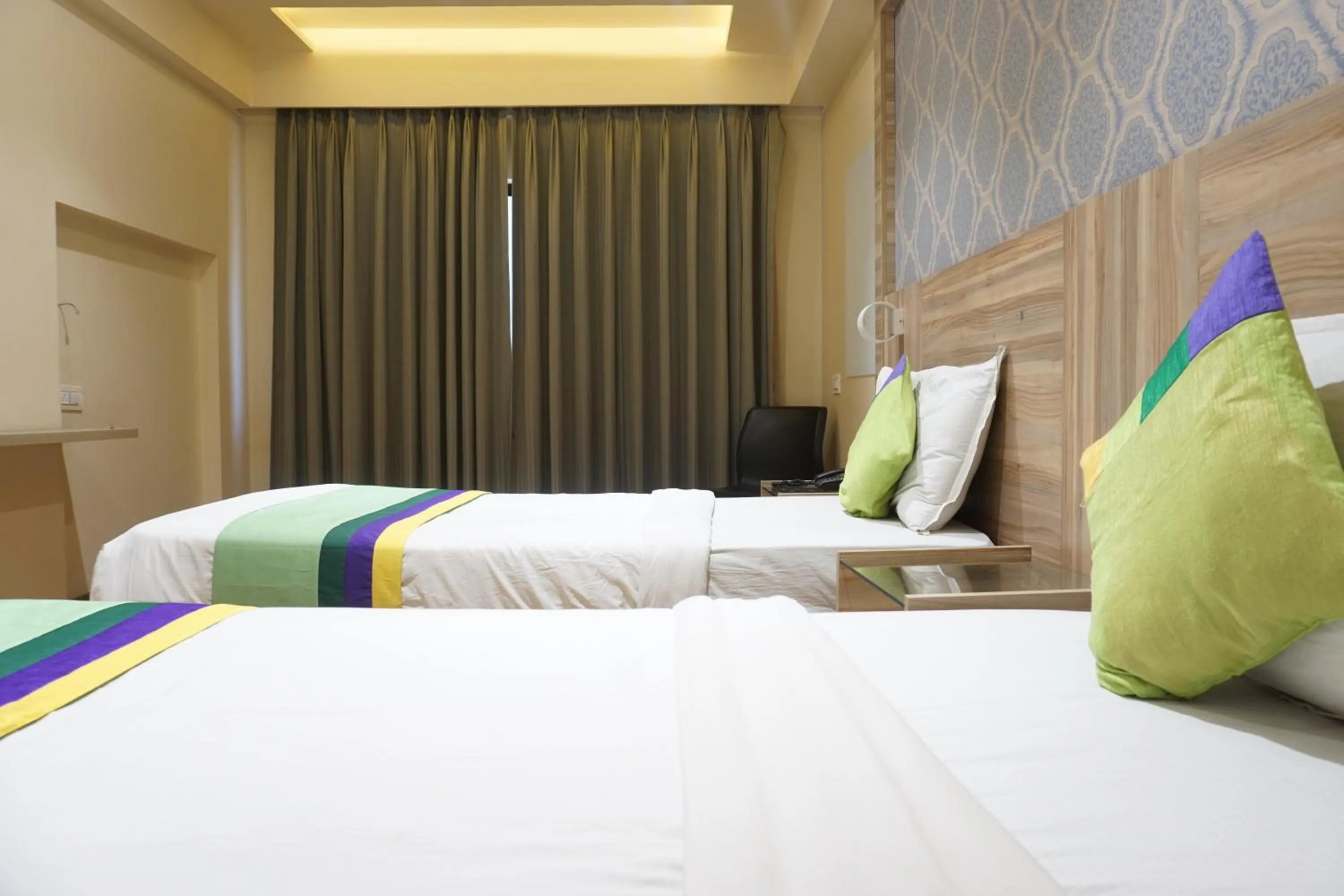 Bedroom, Bed in Treebo Classic Grande, Camp