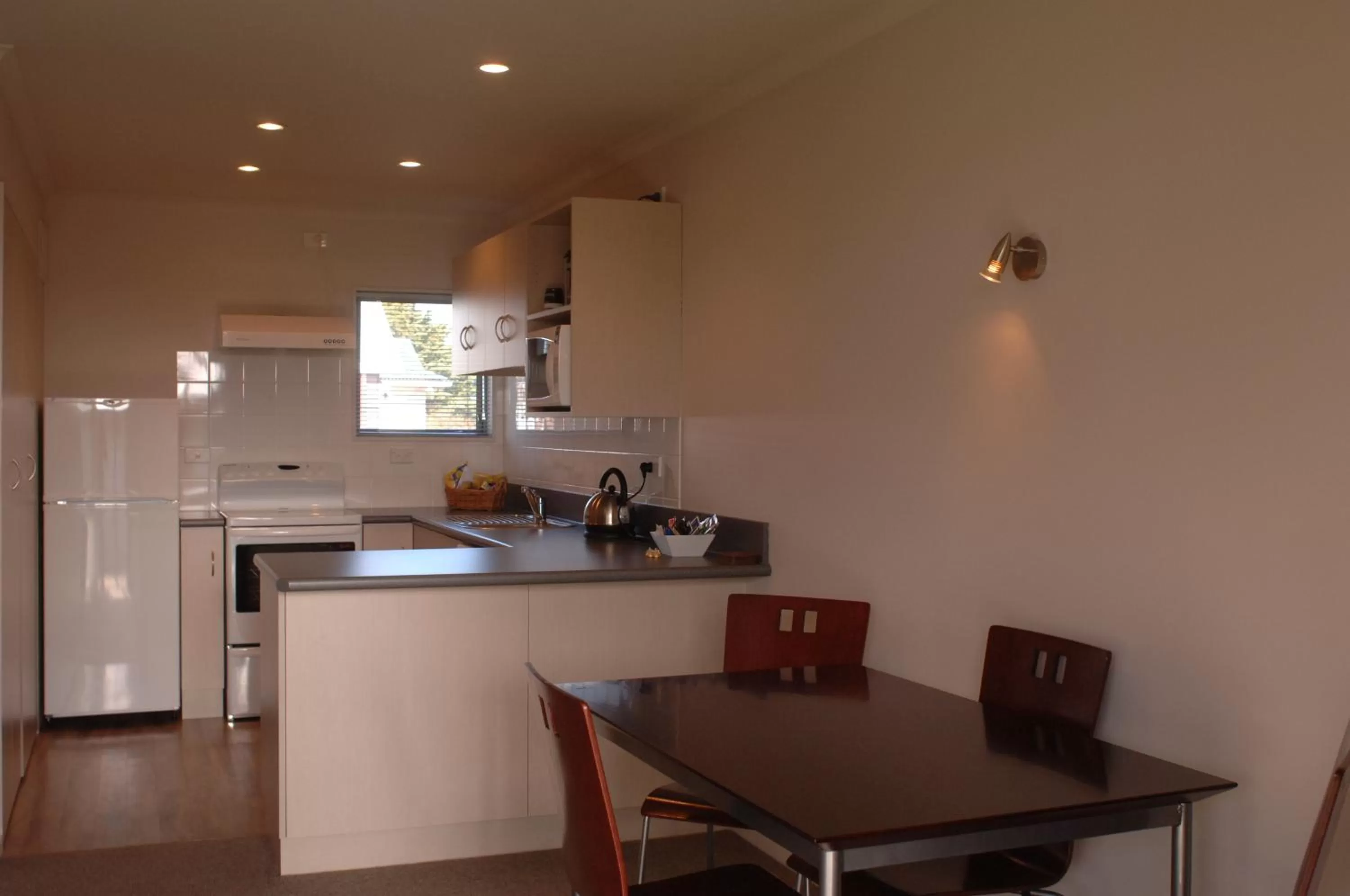 Kitchen/Kitchenette in 295 on Tay Motel