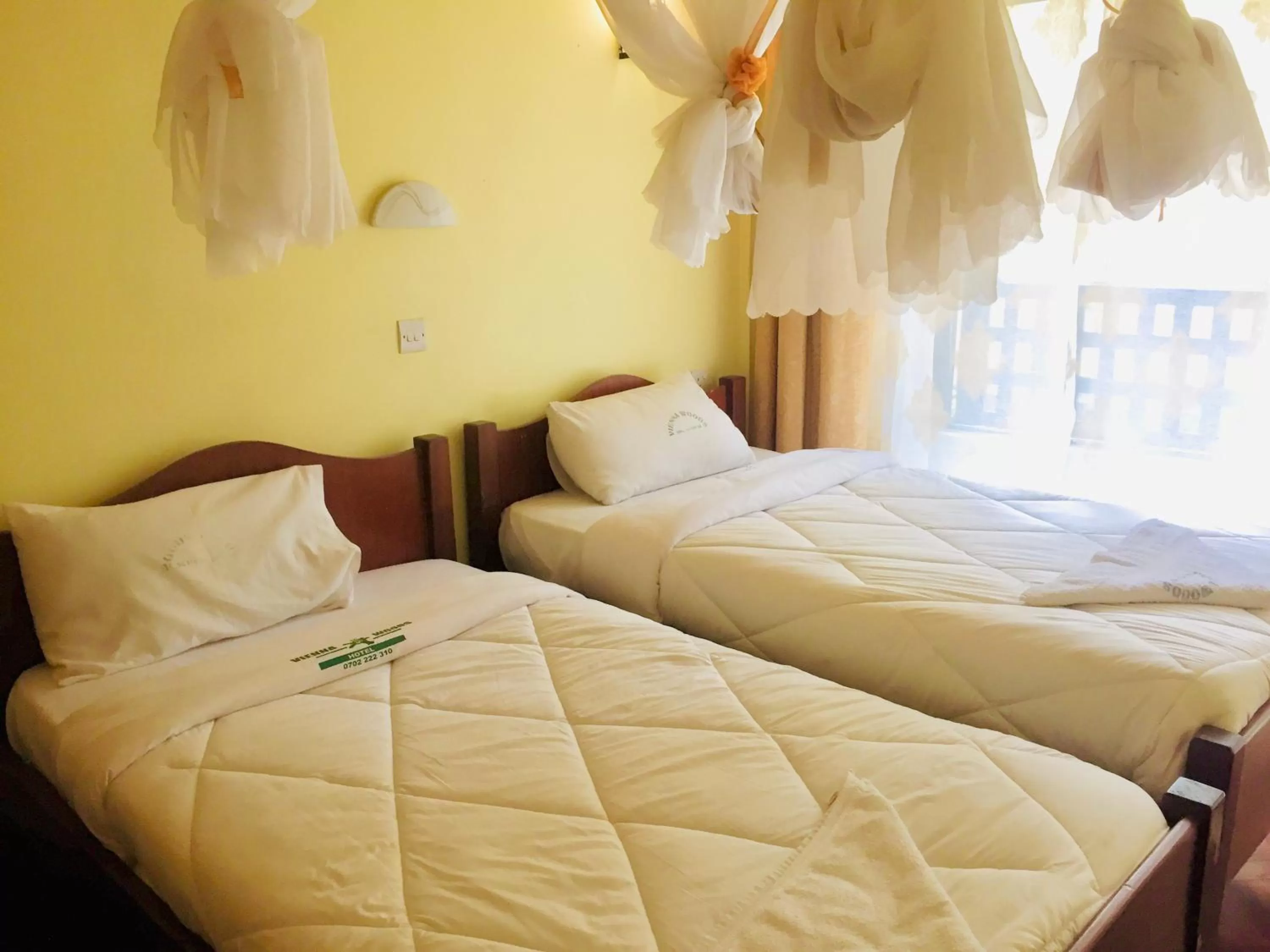 Bed in Vienna Woods Hotel Nakuru