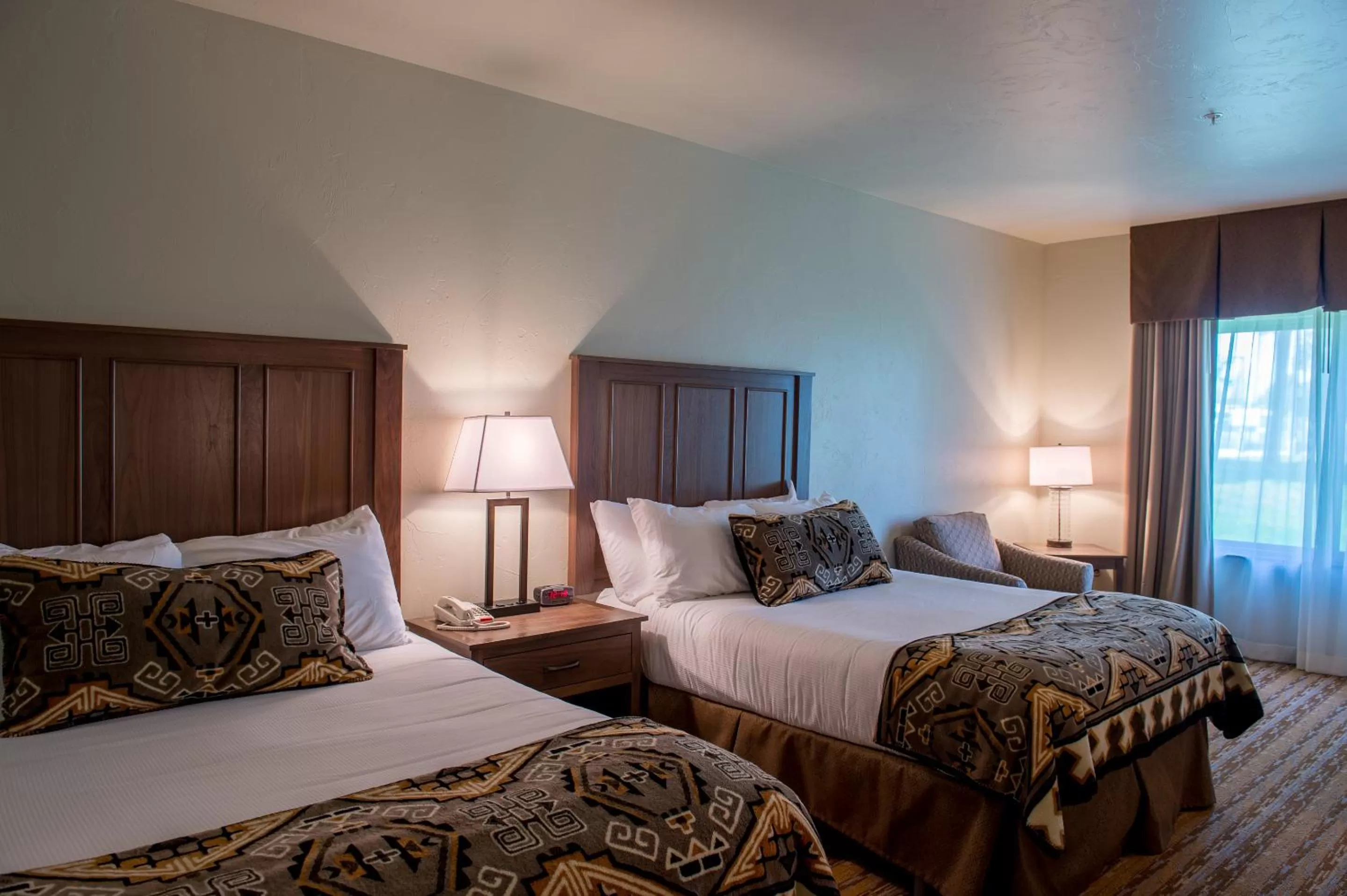 Seating area, Bed in Cedar Creek Lodge & Conference Center