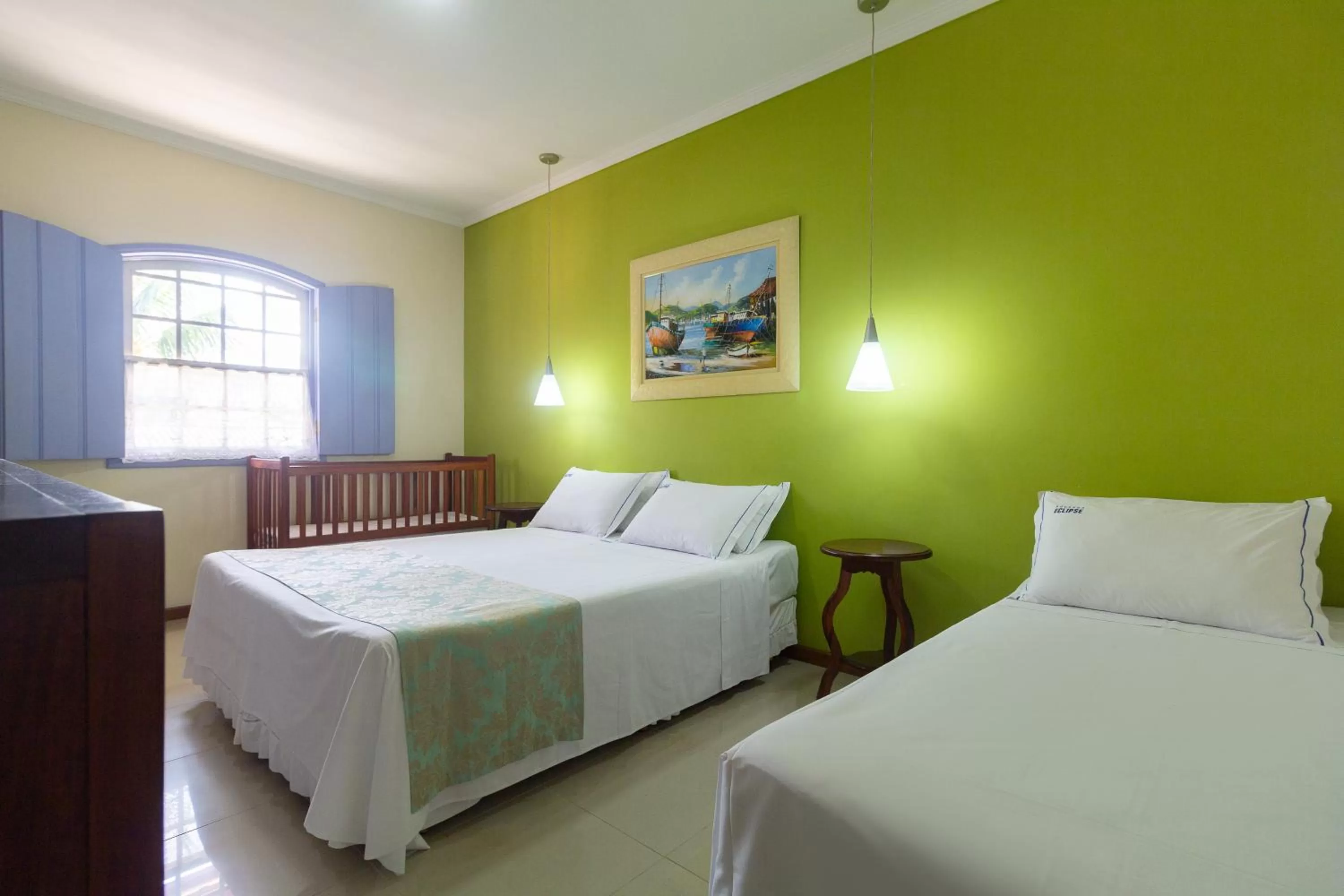 Bed in Pousada Eclipse Paraty