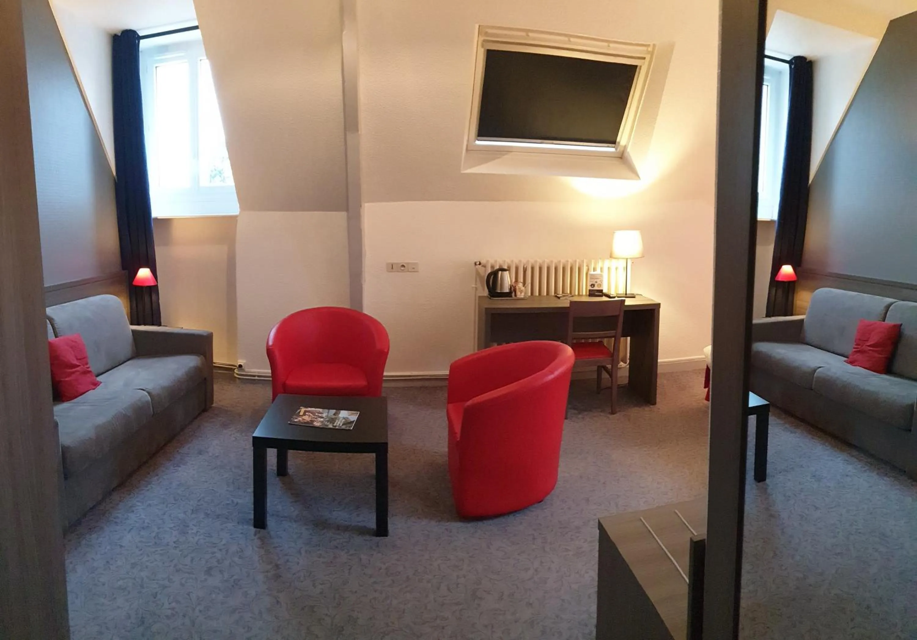 Living room in Hôtel Le Rohan Charme et Caractère