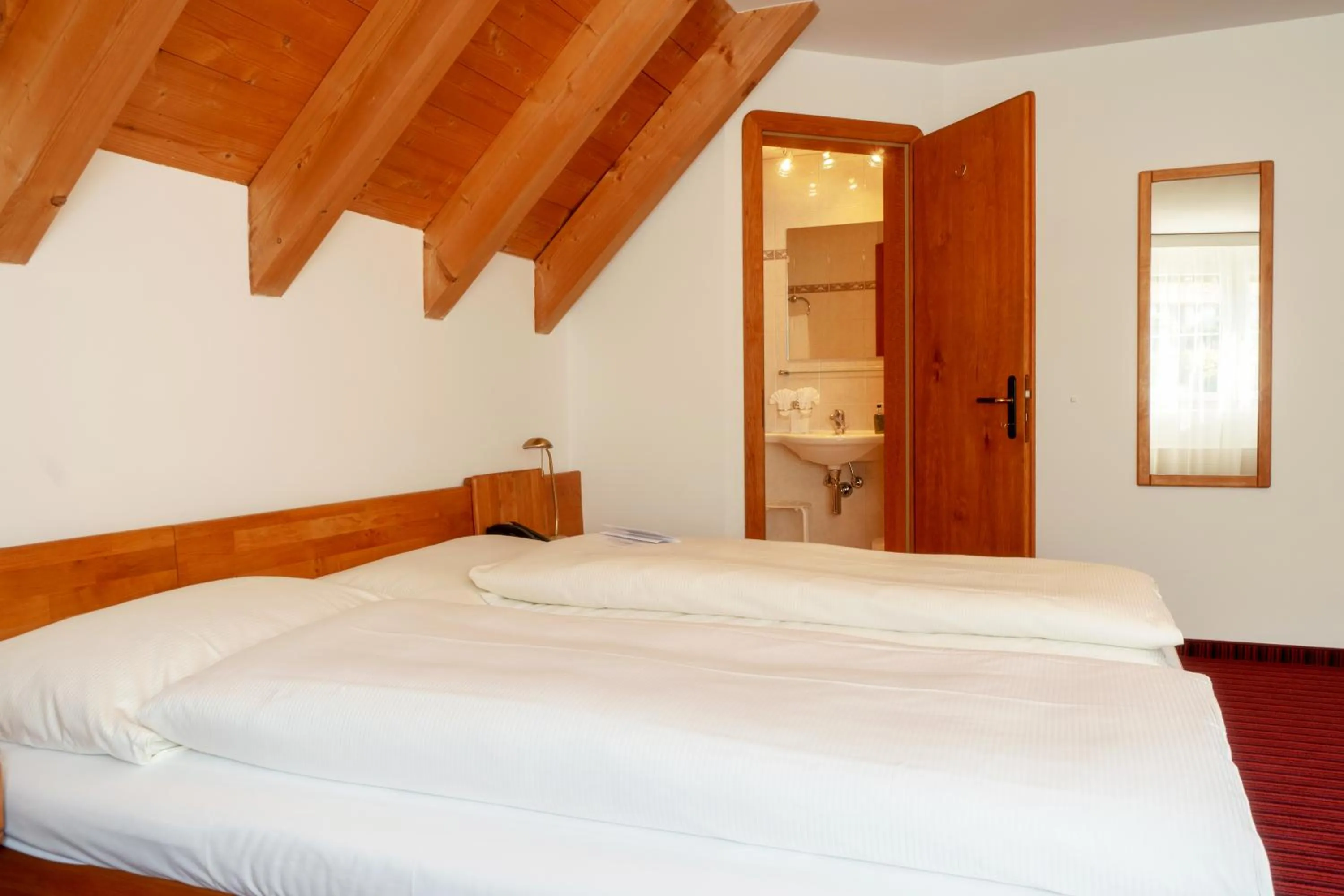 Bedroom, Bed in Typically Swiss Hotel Altana