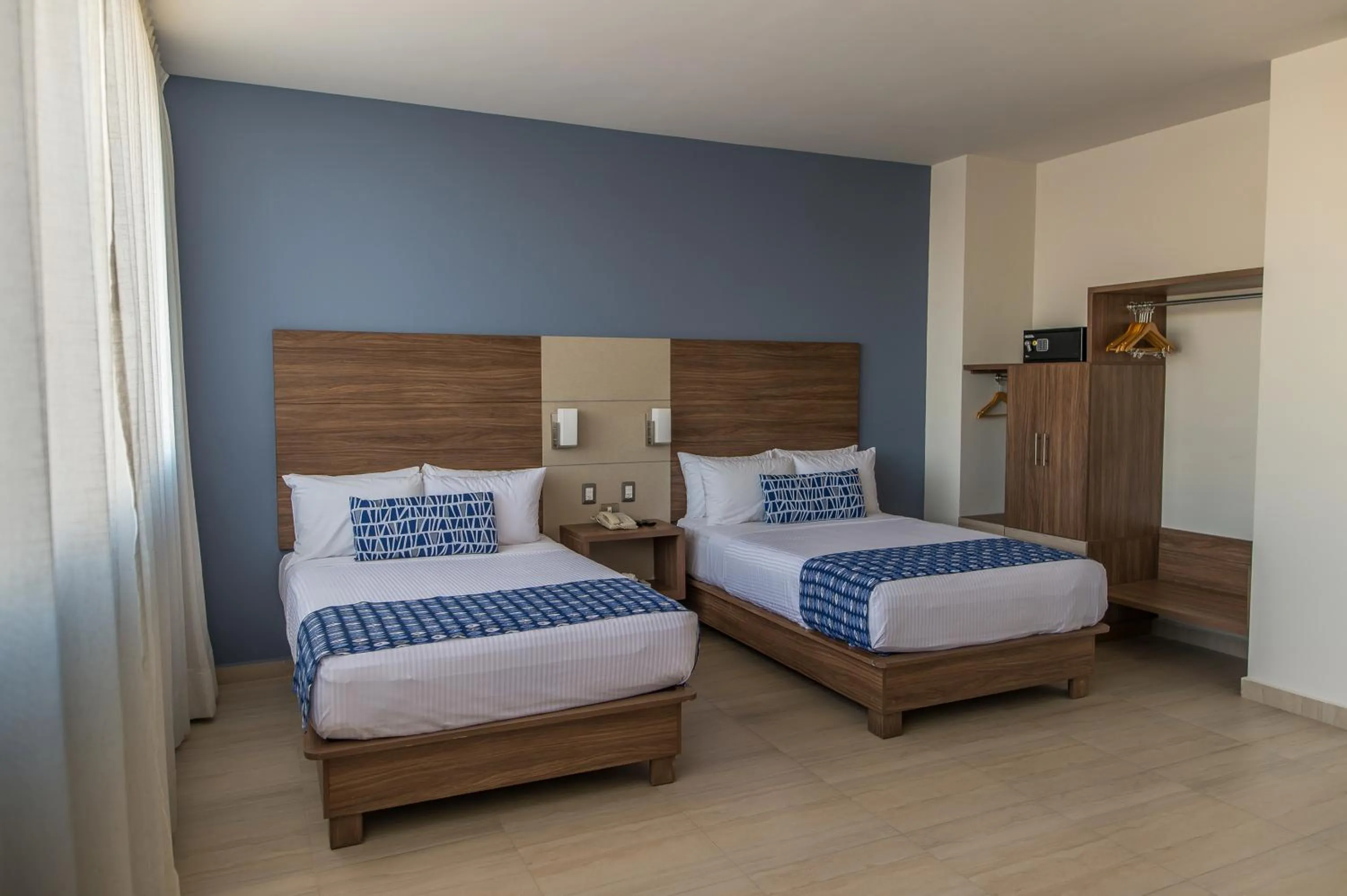 Photo of the whole room, Bed in Ocean View Beach Hotel