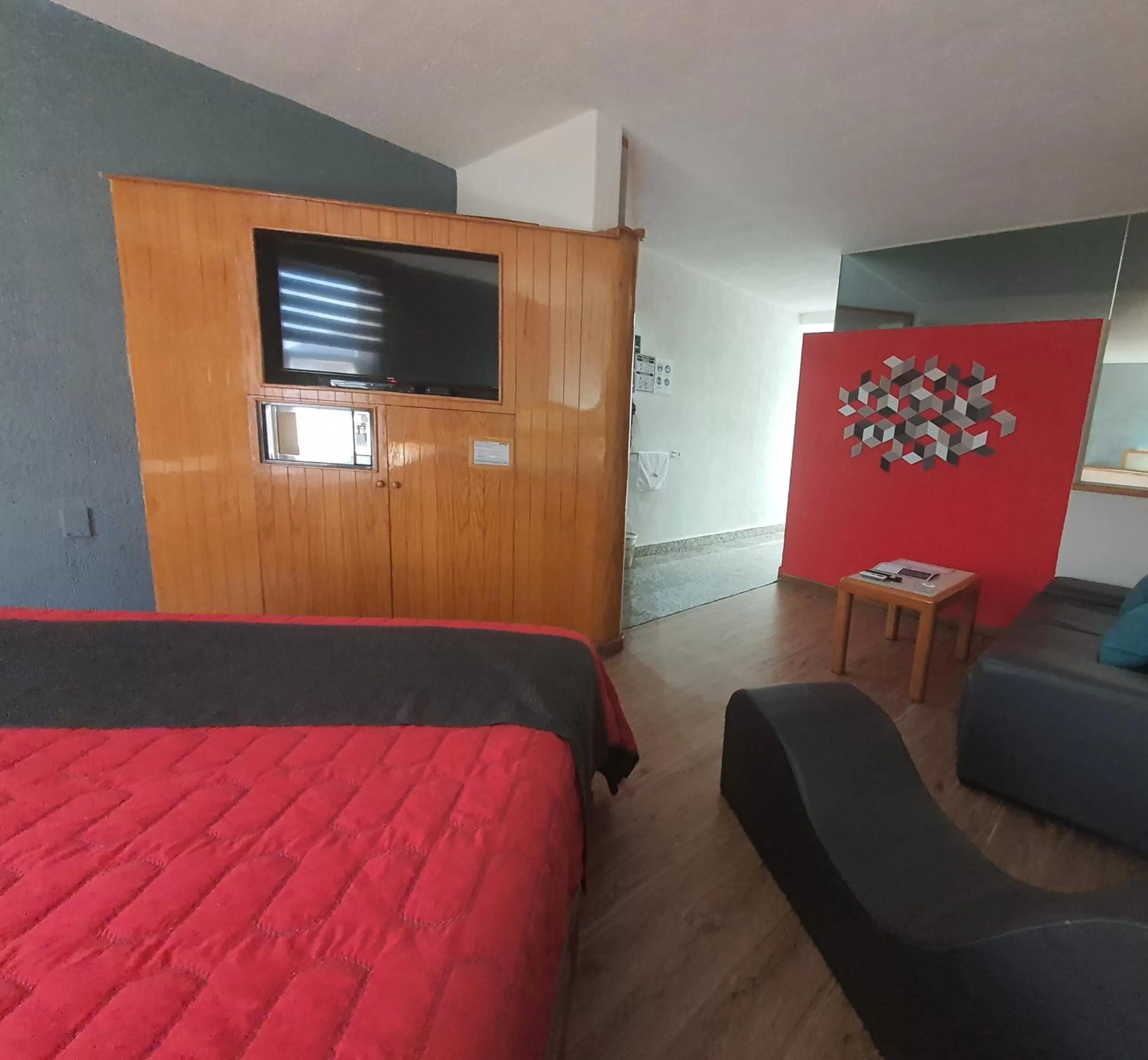 TV/Entertainment Center in Hotel Alcampo