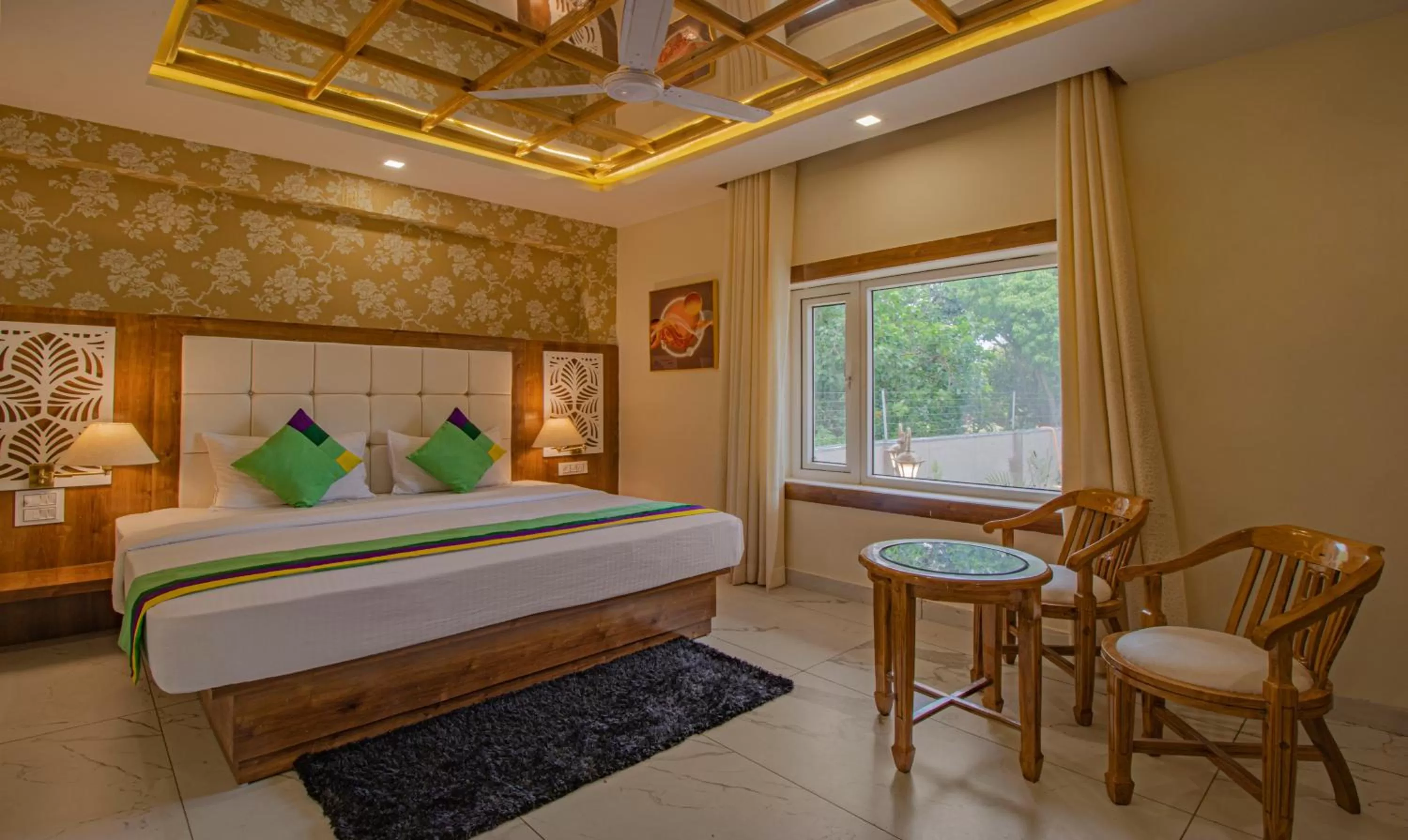 Bed in Treebo Trend Haveli Resort Roots Bhupatwala