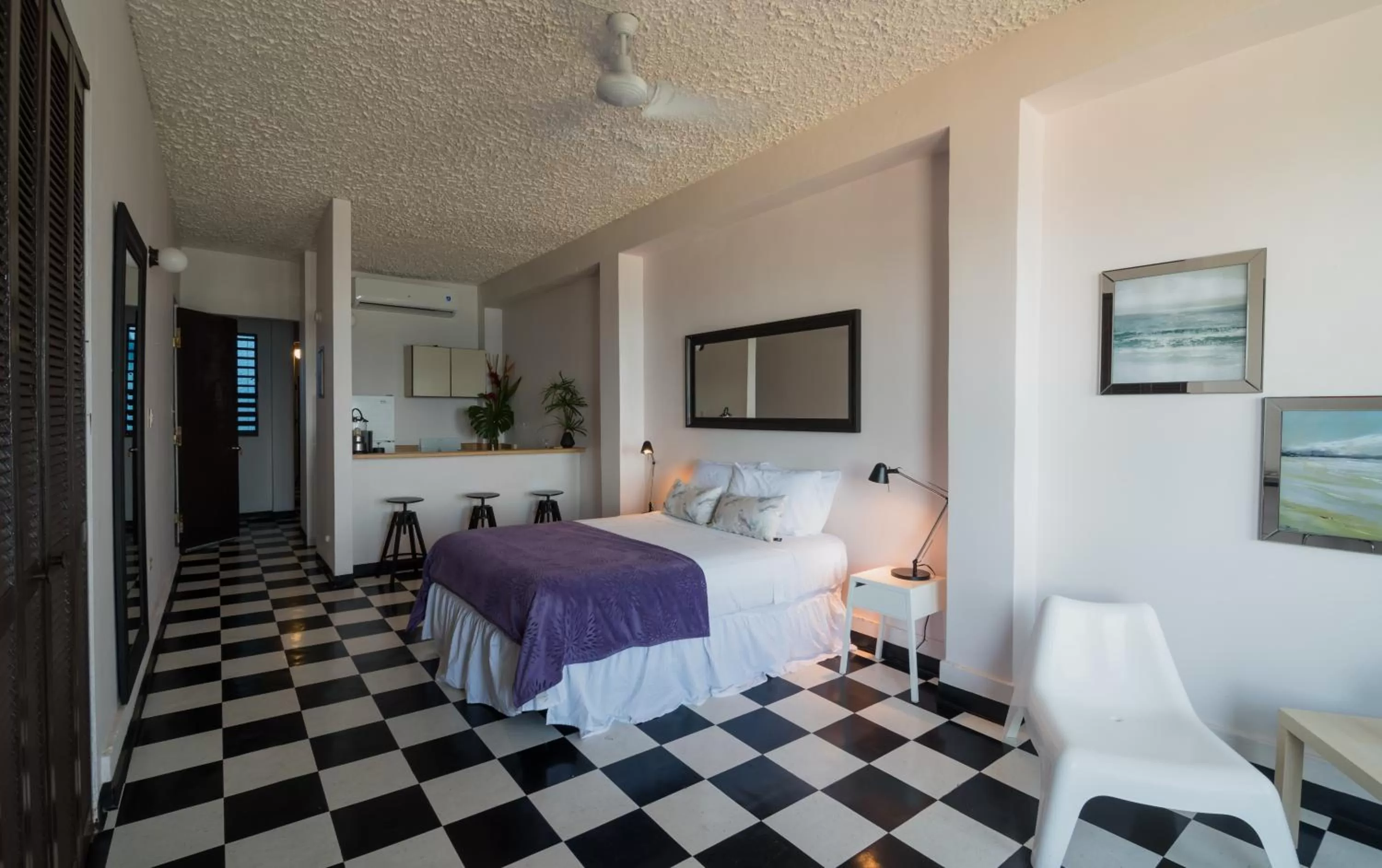 Photo of the whole room, Bed in La Capitana Old San Juan Building