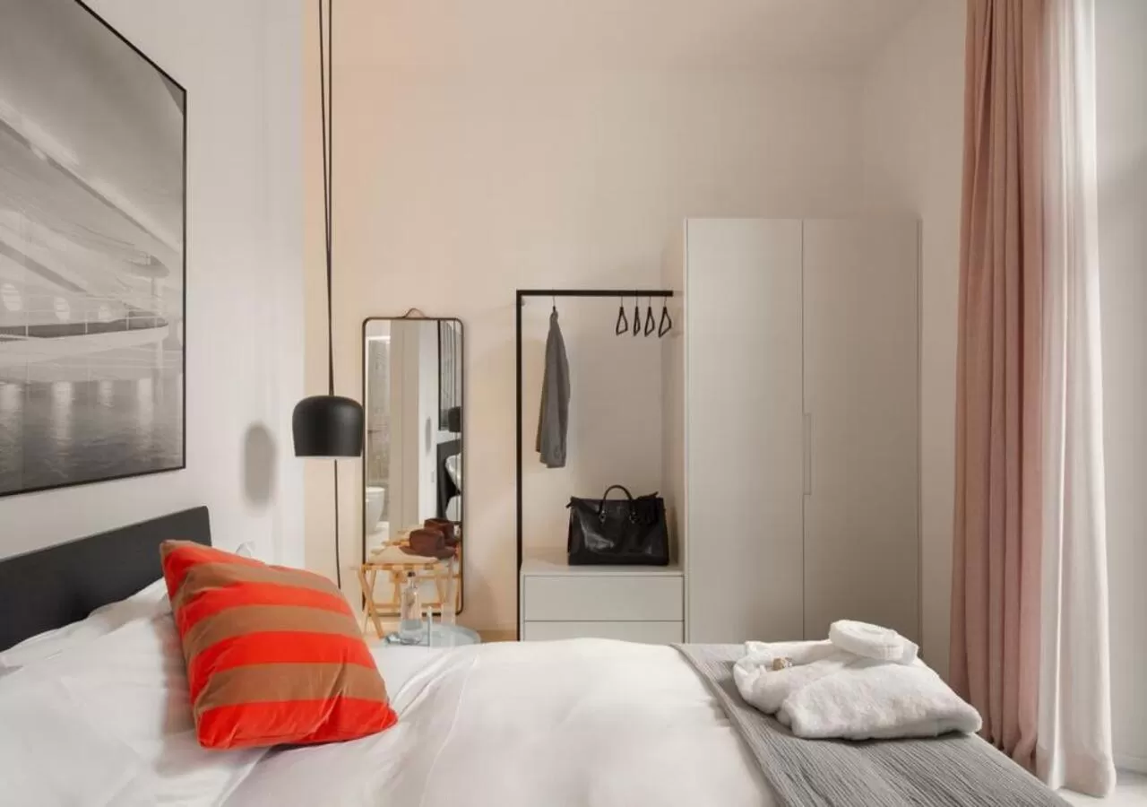 Bed in BB Hotels Aparthotel Collection Il Michelangelo