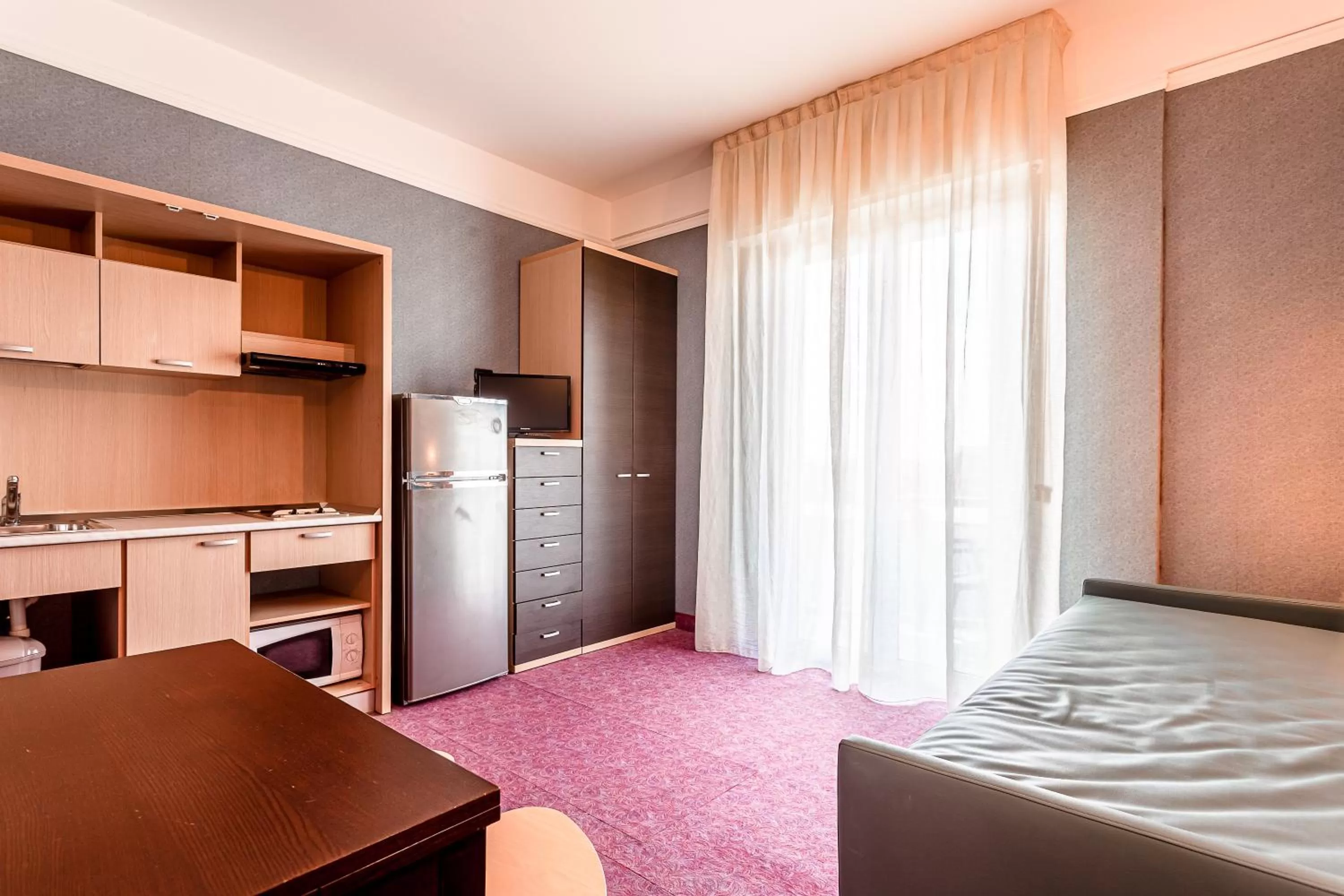 Photo of the whole room, Bed in Residence & Suites