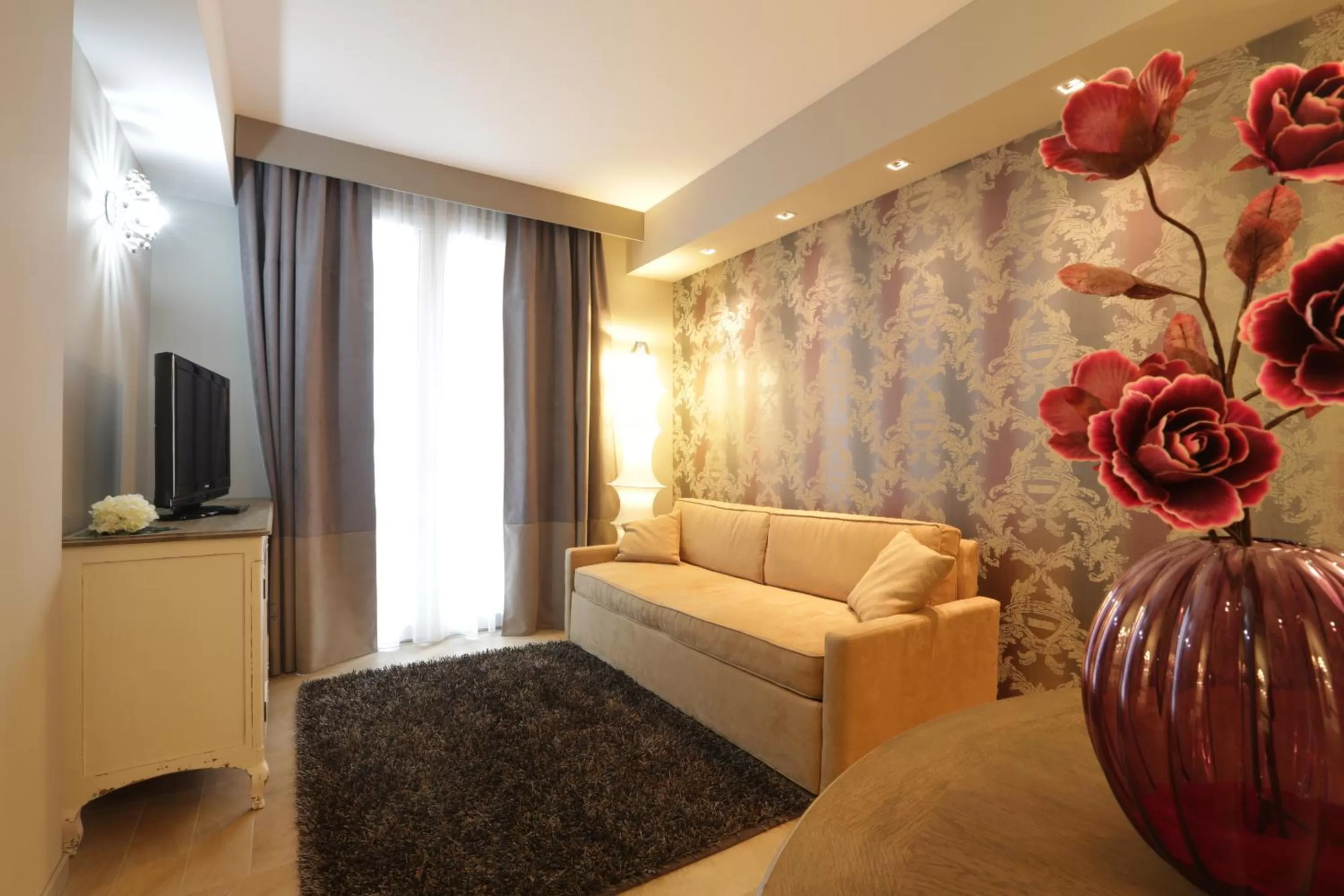 Seating area, Bed in Admiral Park Hotel by Falco D'Oro Hotels