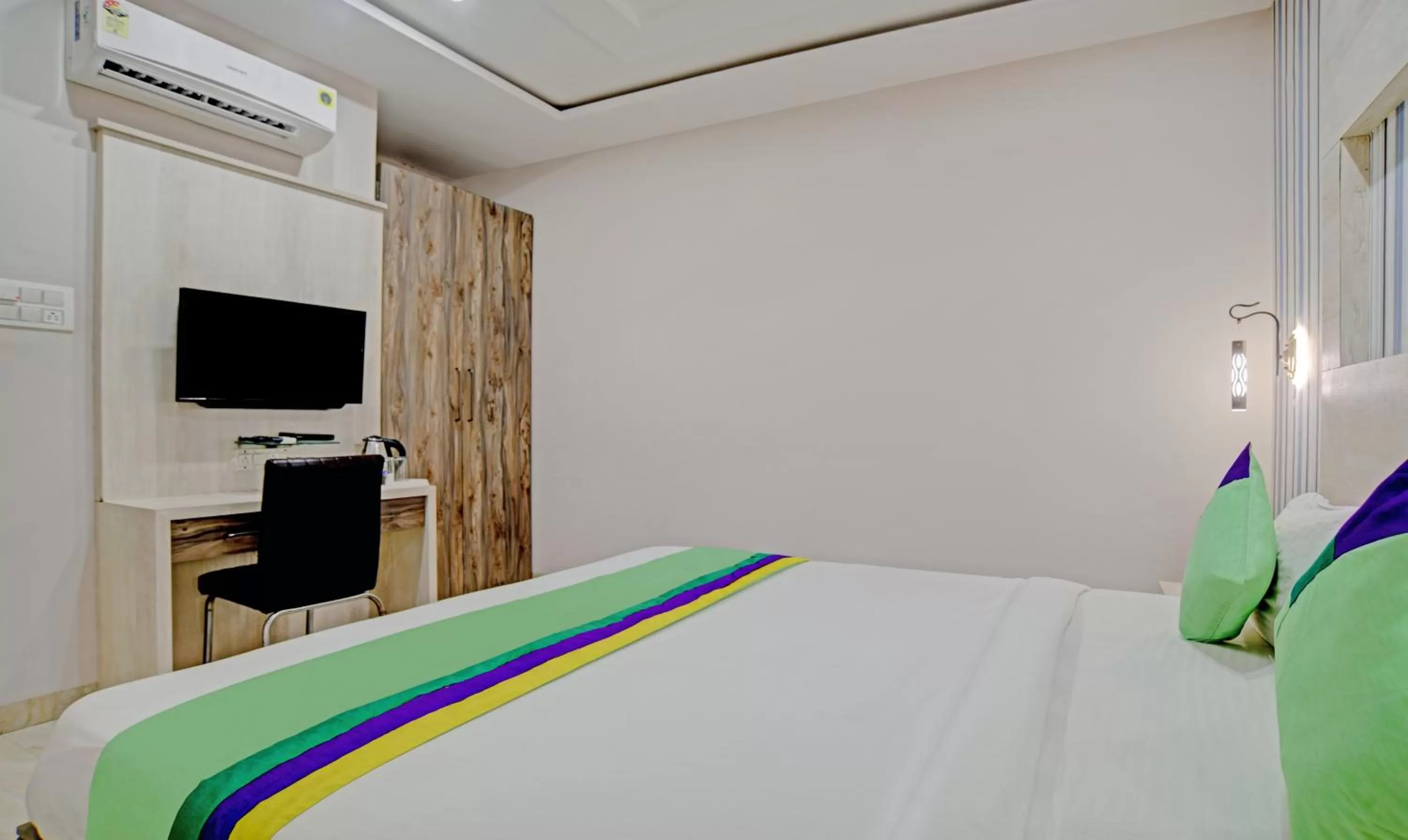 Bed in Treebo Trend Shiv Chhaya Vijay Nagar