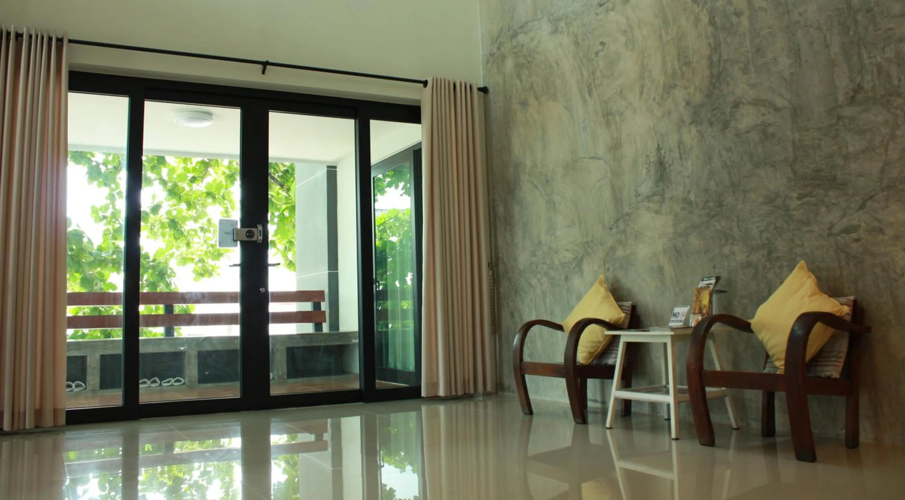 Communal lounge/ TV room in Jamjuree Home at Udonthani