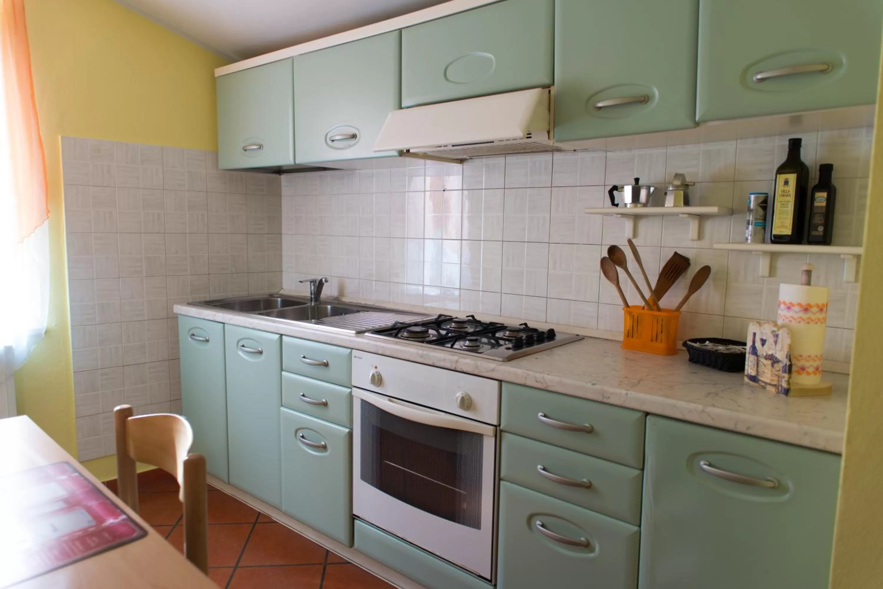 Kitchen or kitchenette in Al Cardinale Rooms & Studios