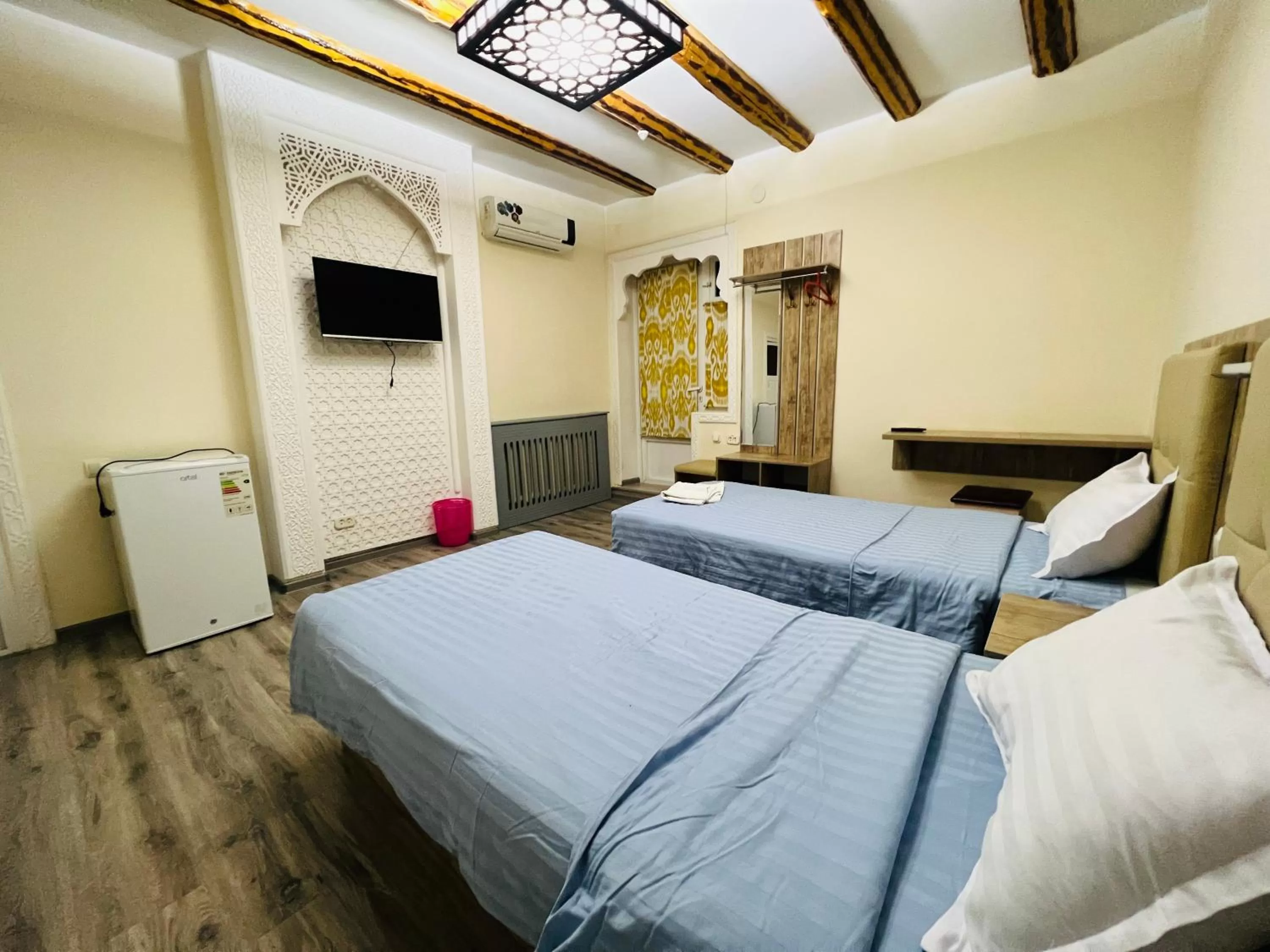 View (from property/room), Bed in Bukhara house hotel