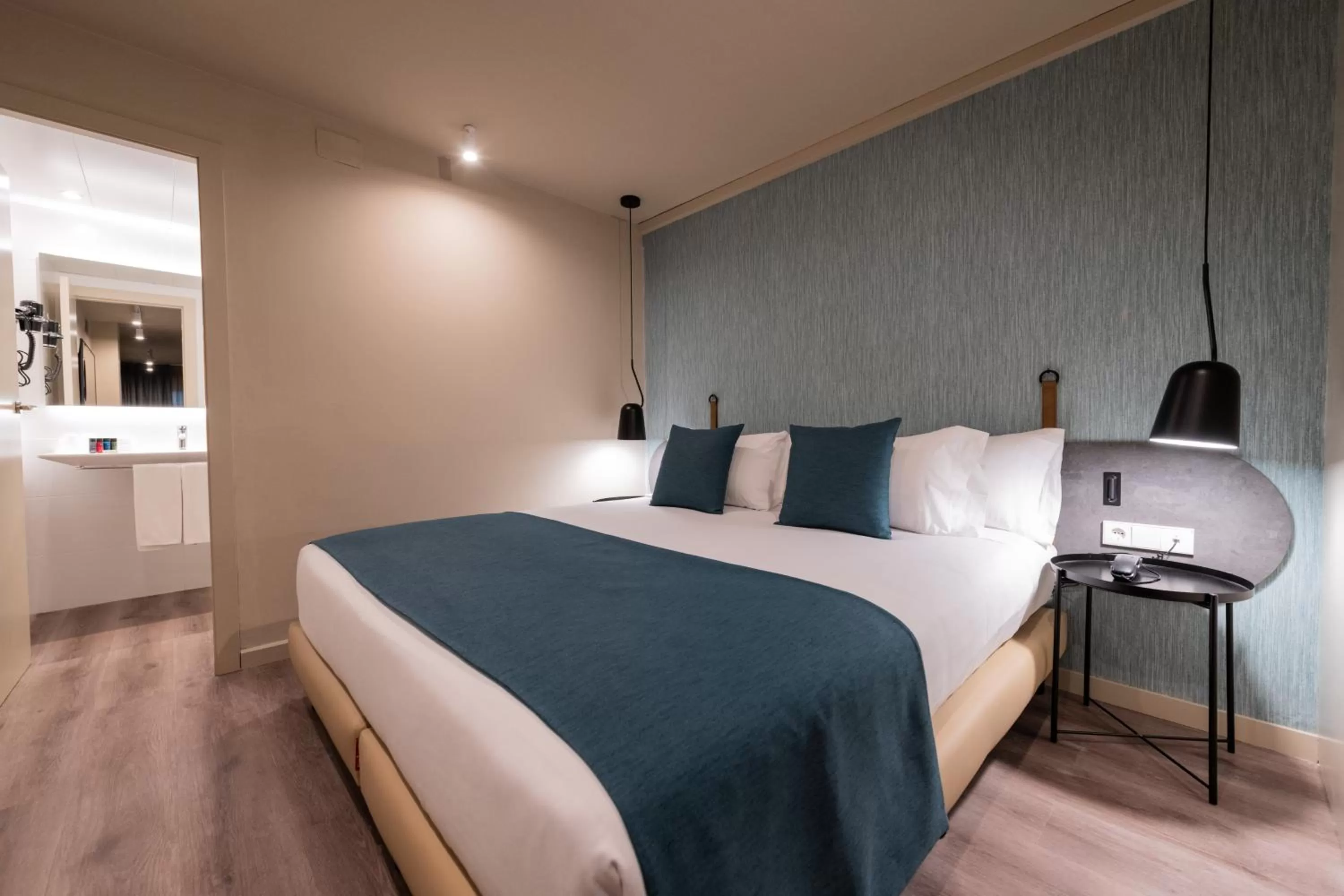 Bed in Atenea Rekord Suites Barcelona
