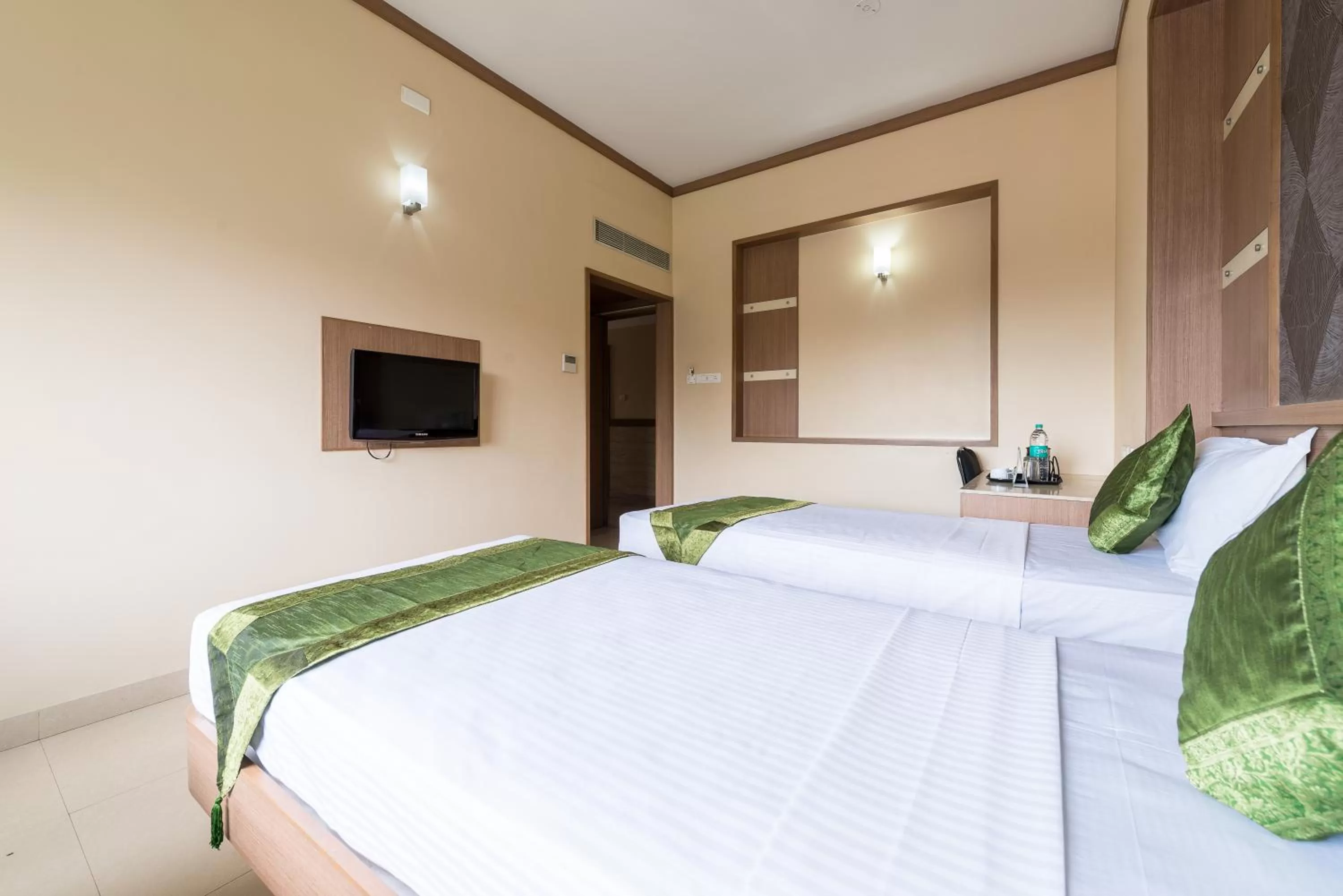 Bed in Treebo ESS Grande