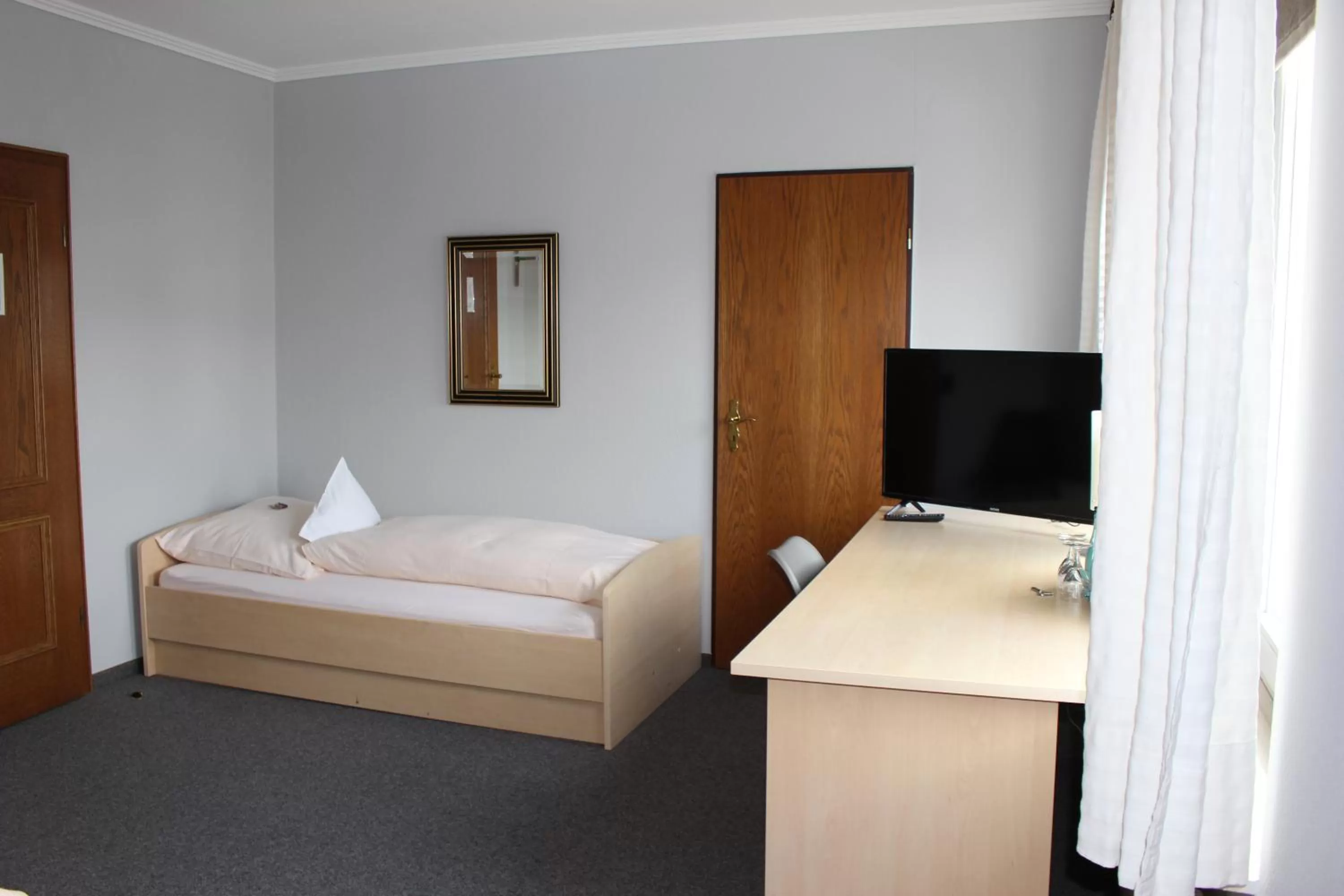 Bedroom, Bed in Hotel Schlömer