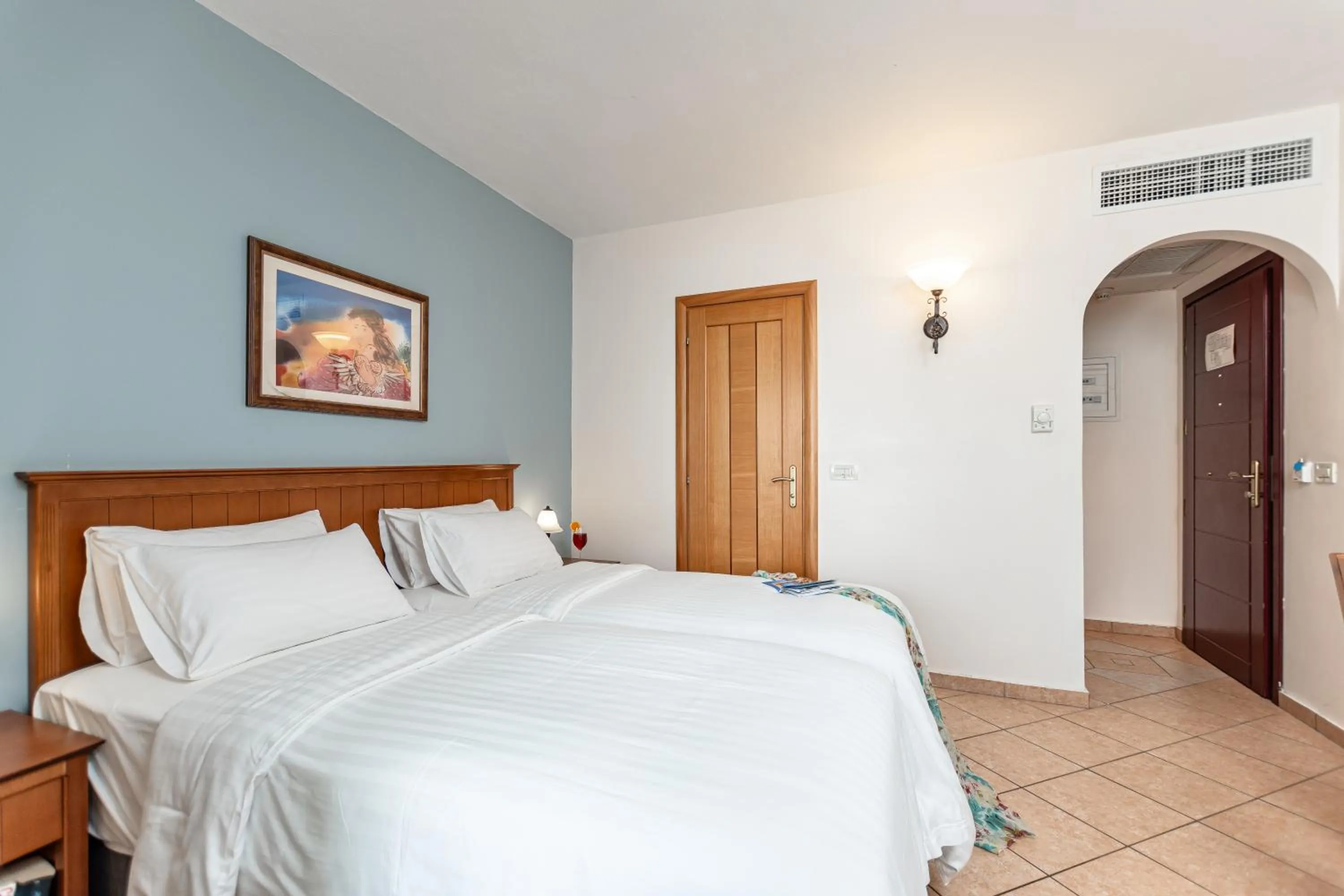 Bed in Naxos Resort Beach Hotel