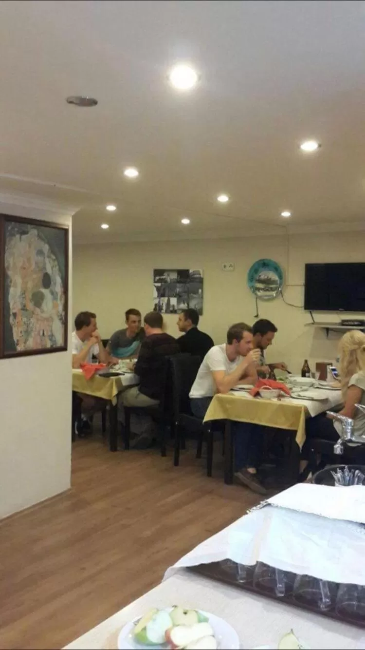 People in Hotel Crowded House