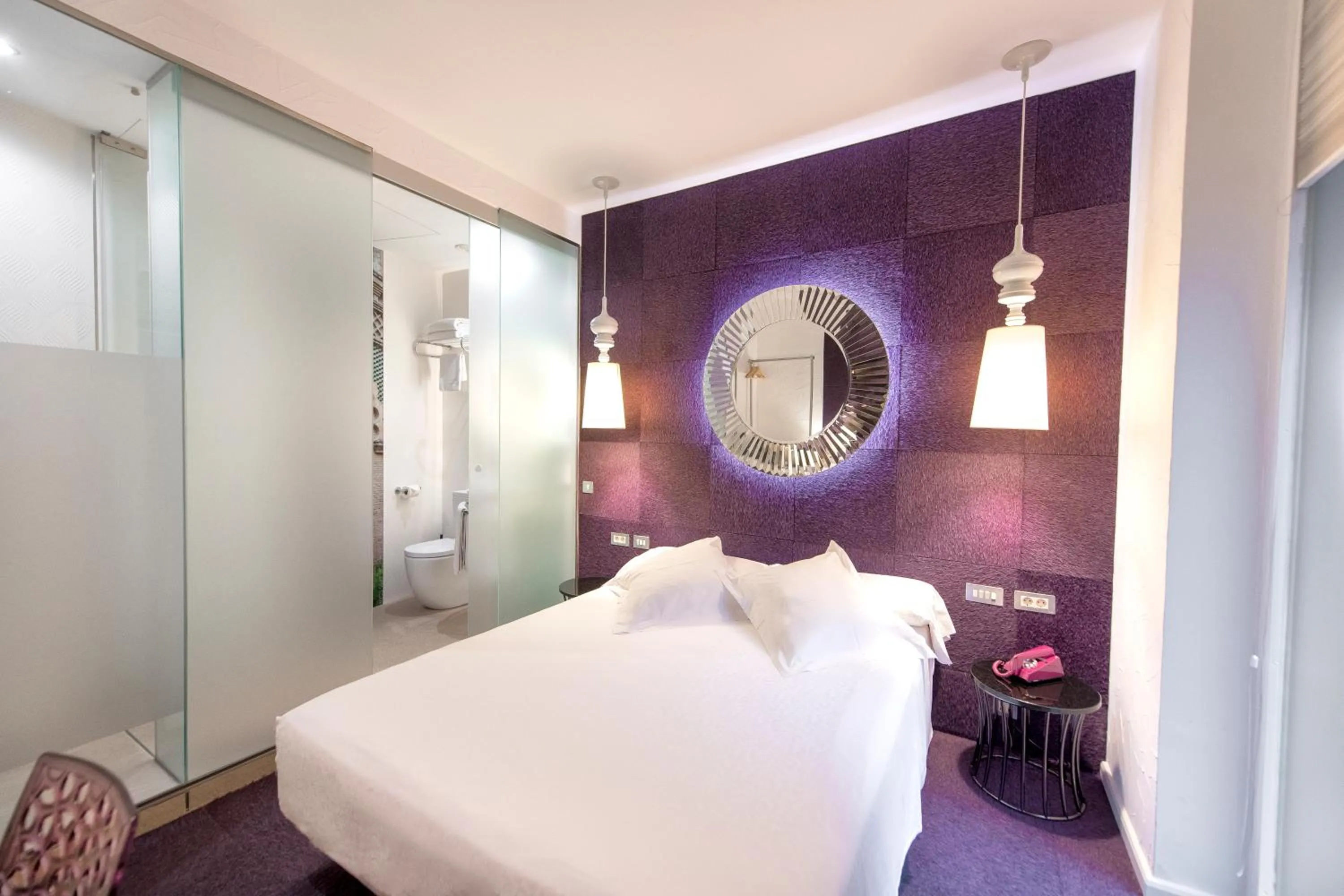 Bed in Posada del Dragón Boutique Hotel