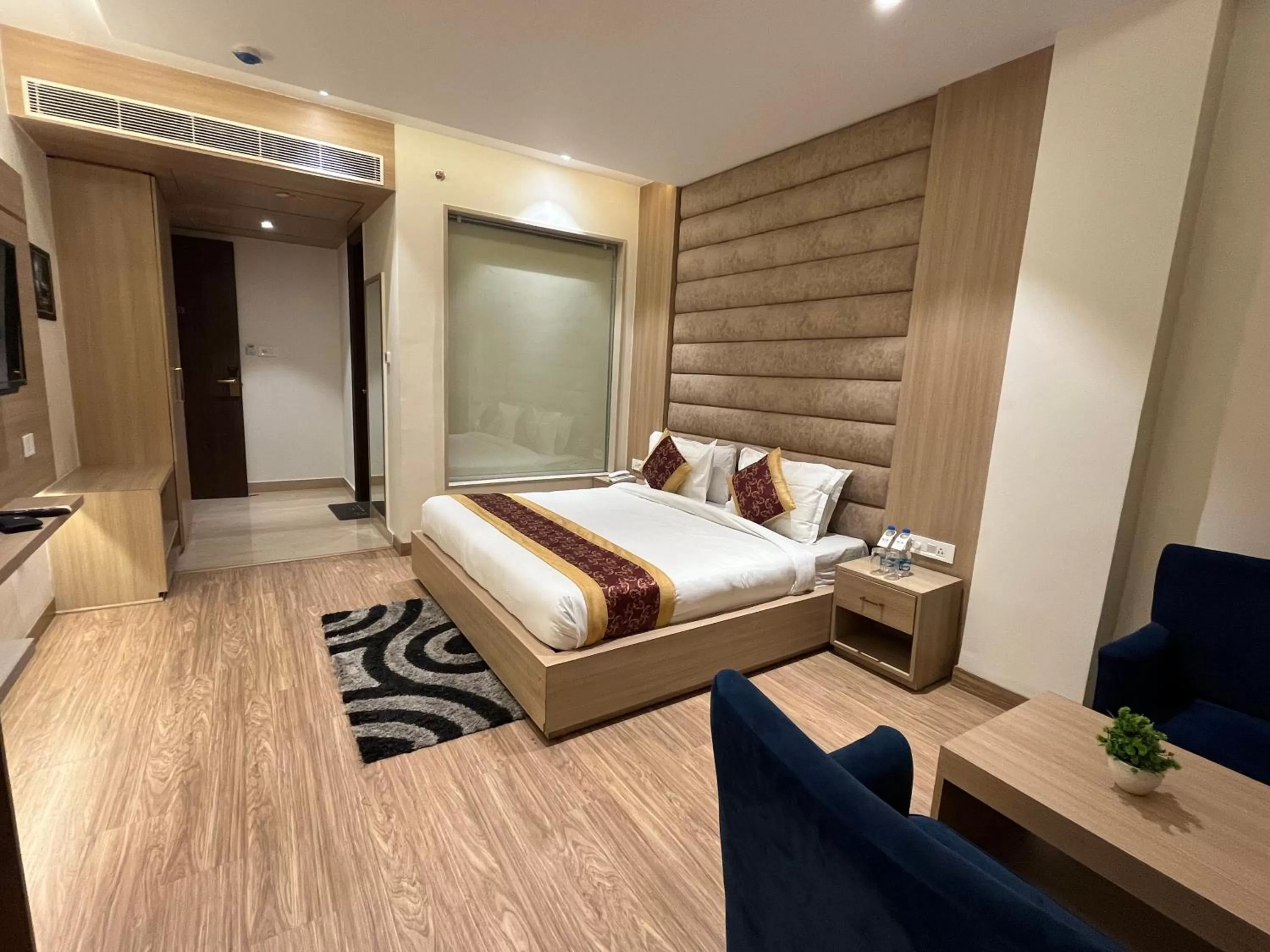 Photo of the whole room, Bed in RRV Hotel