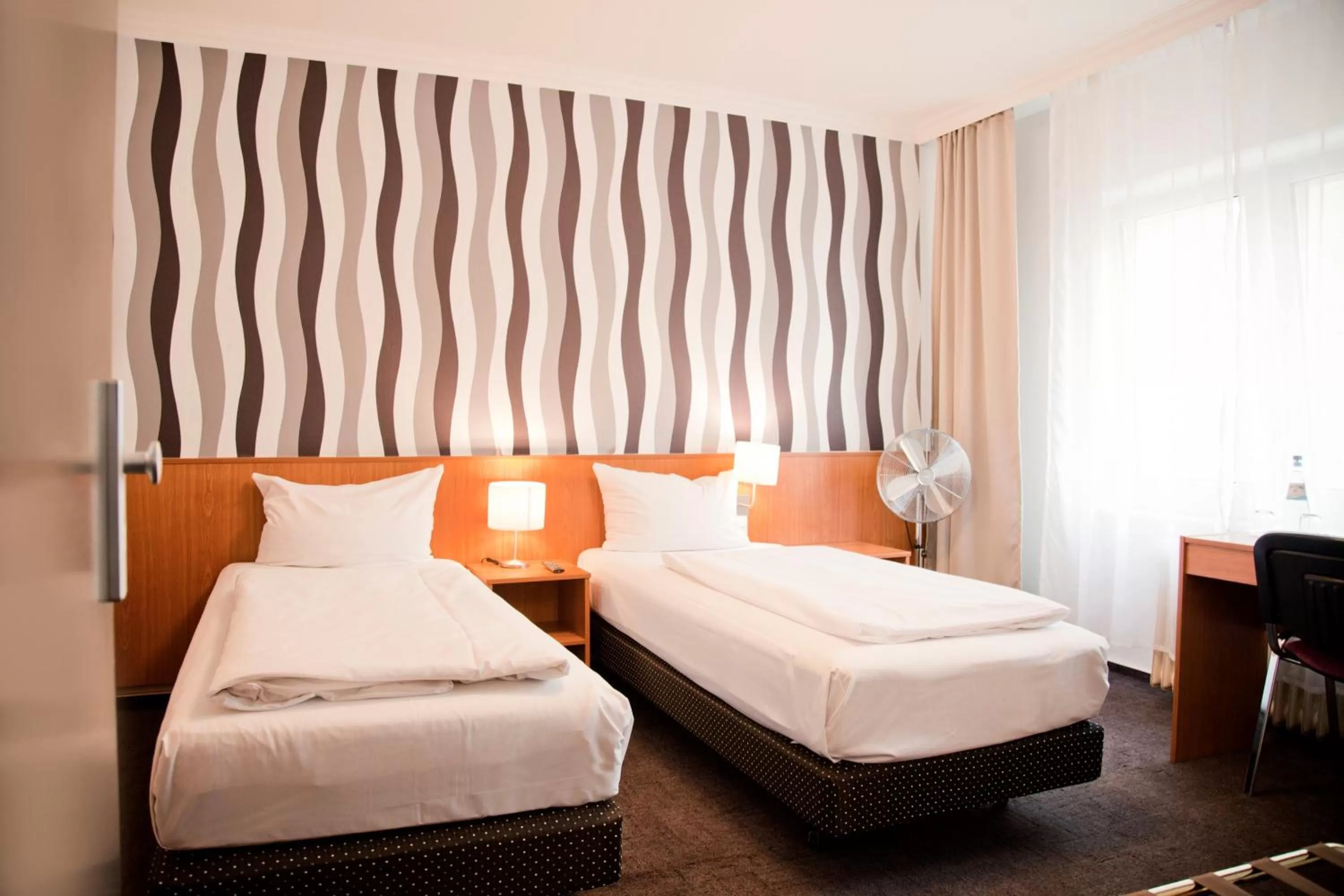 Photo of the whole room, Bed in Les Nations