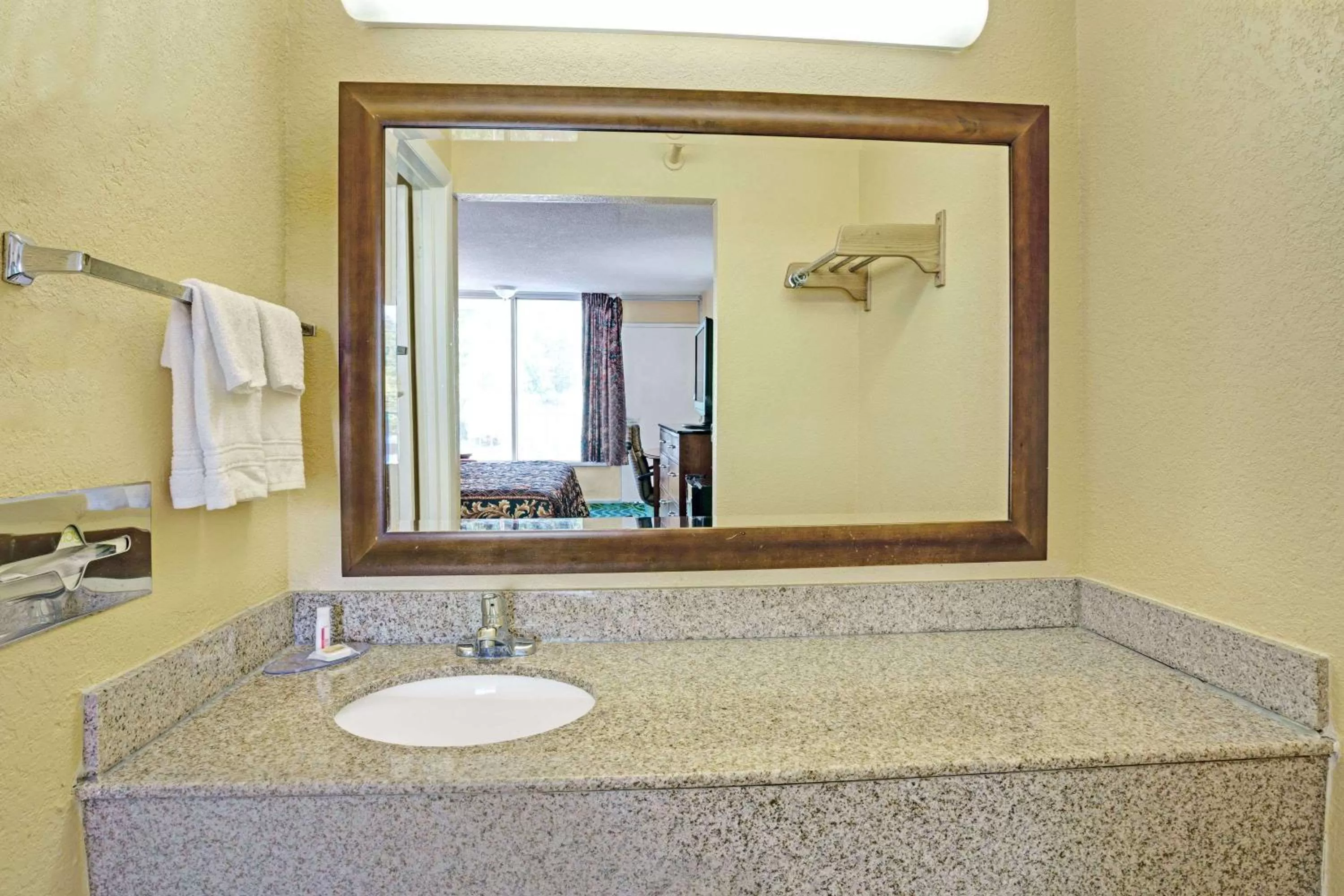 Bathroom in Days Inn by Wyndham Norfolk Military Circle