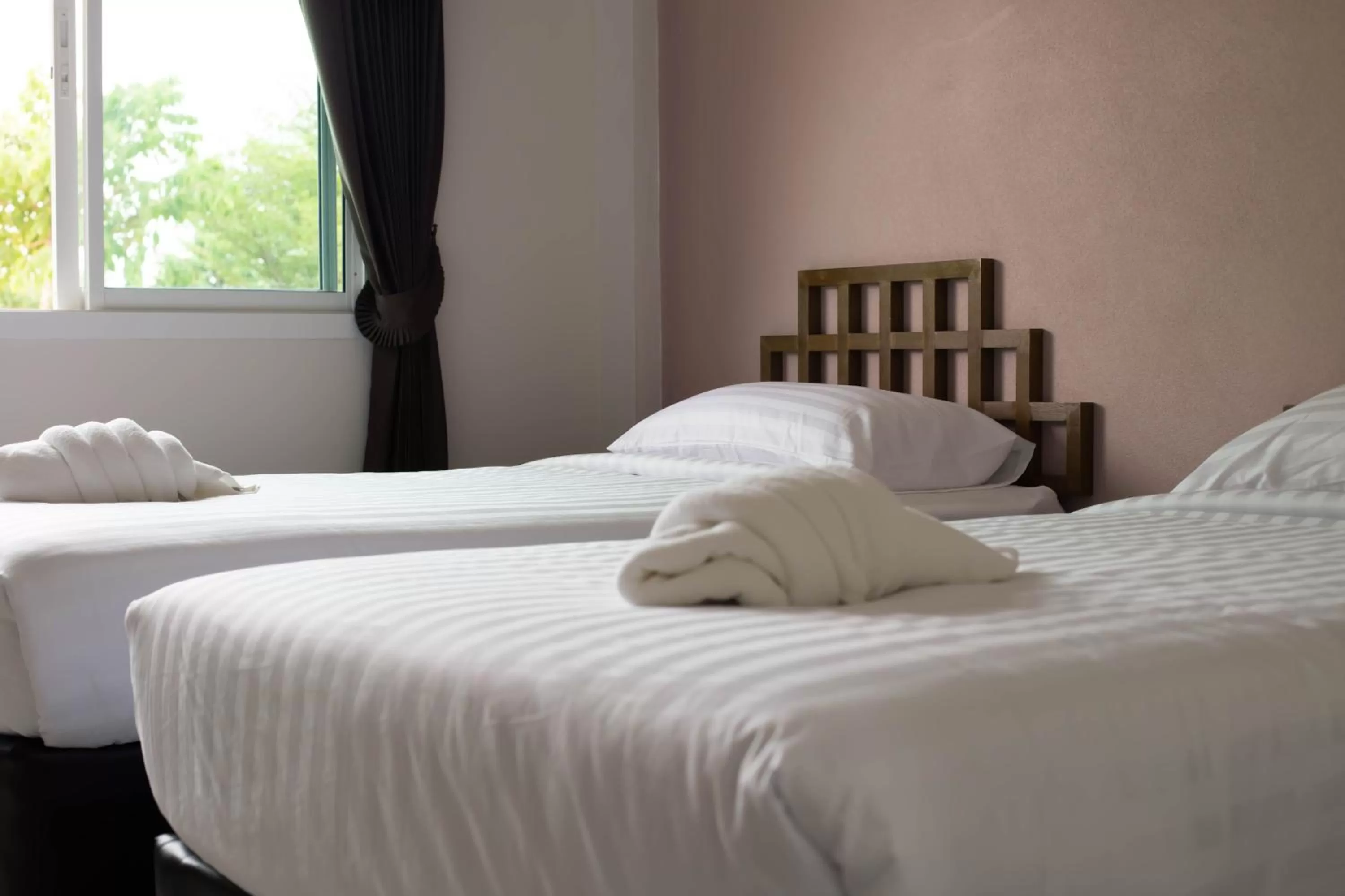 Bed in Thaimit Resort