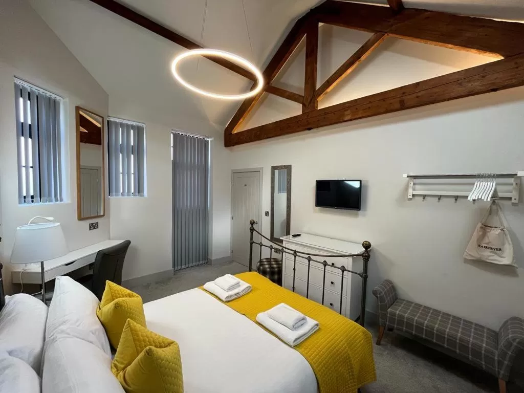 Bed in The Falcon Hotel