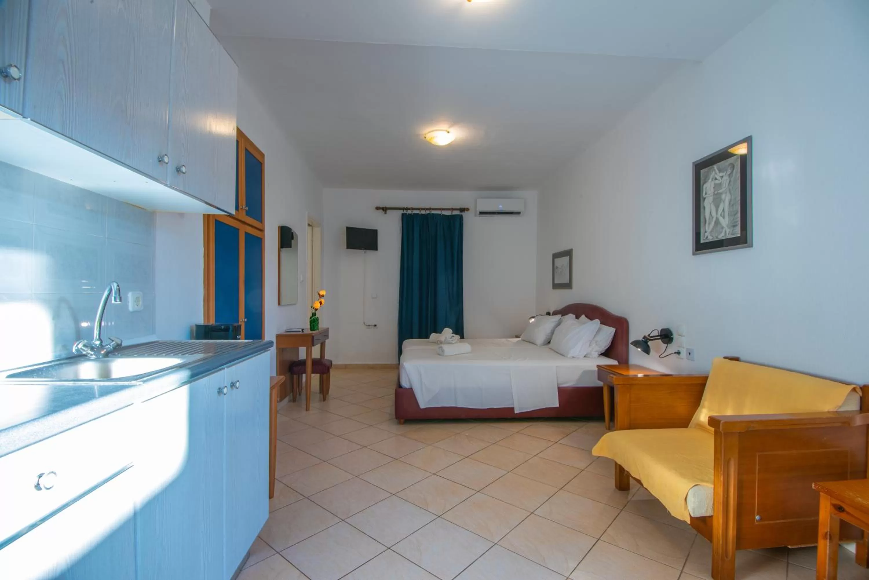 Bed in Polydoros Appartments