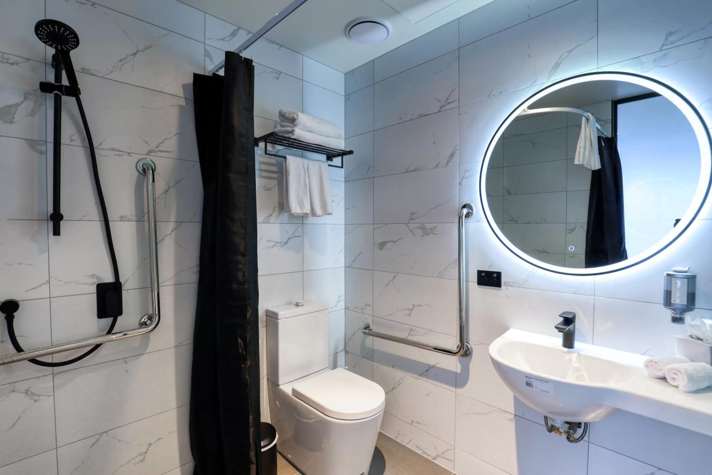 Bathroom in Microtel by Wyndham Wellington