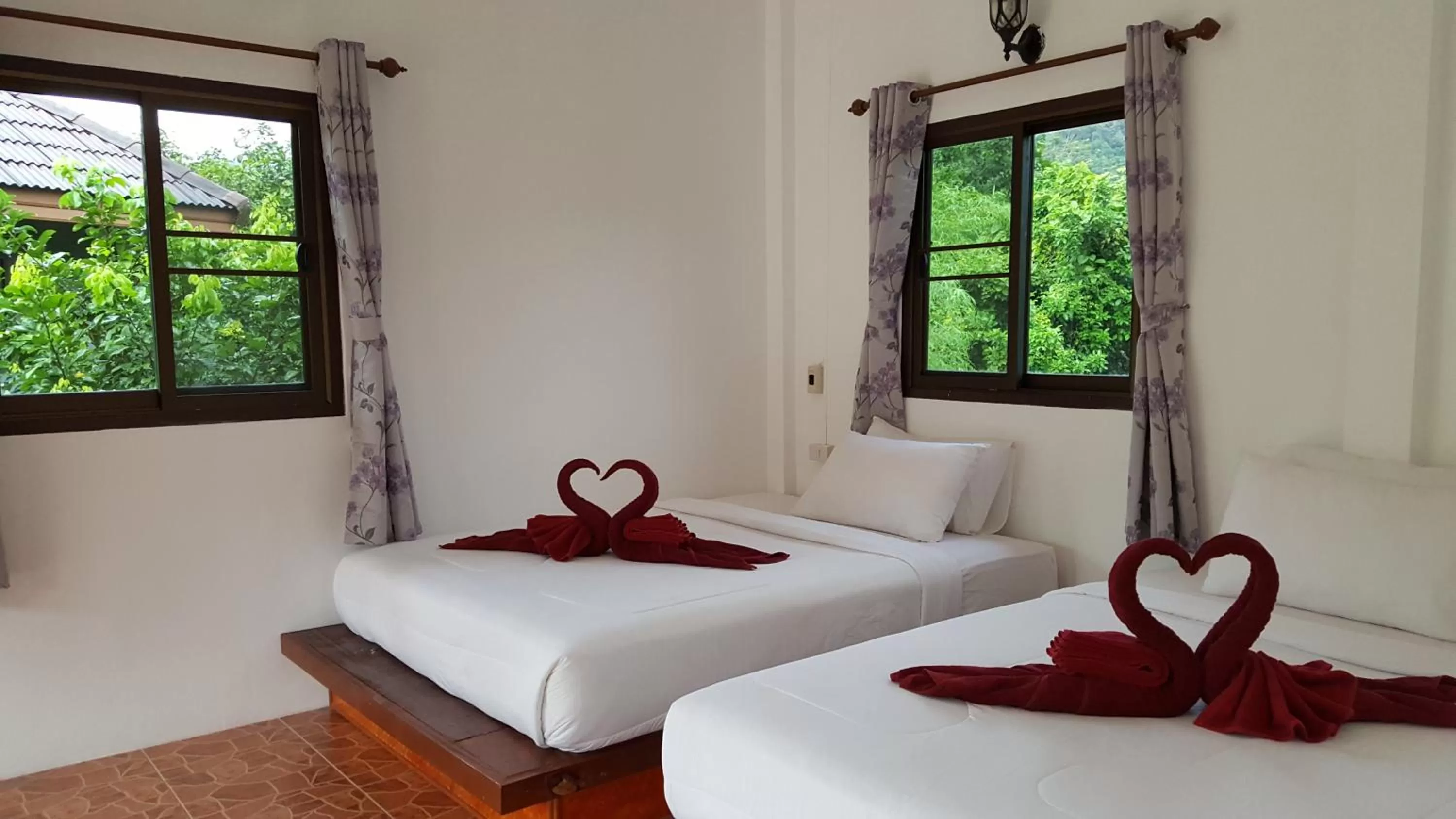 Bed in Khao Sok Jungle Huts Resort