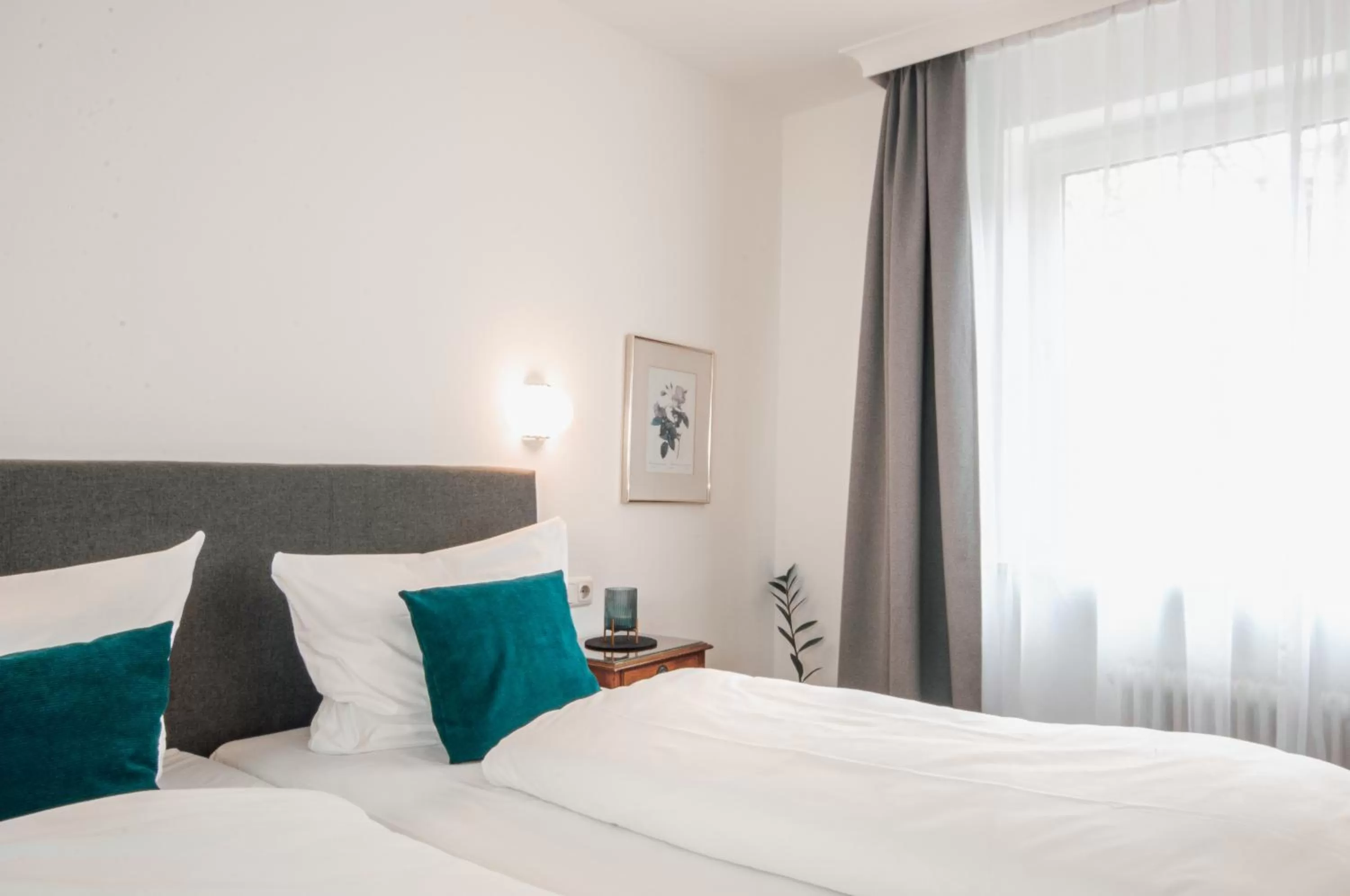 Photo of the whole room, Bed in Hotel Altmünchen by Blattl