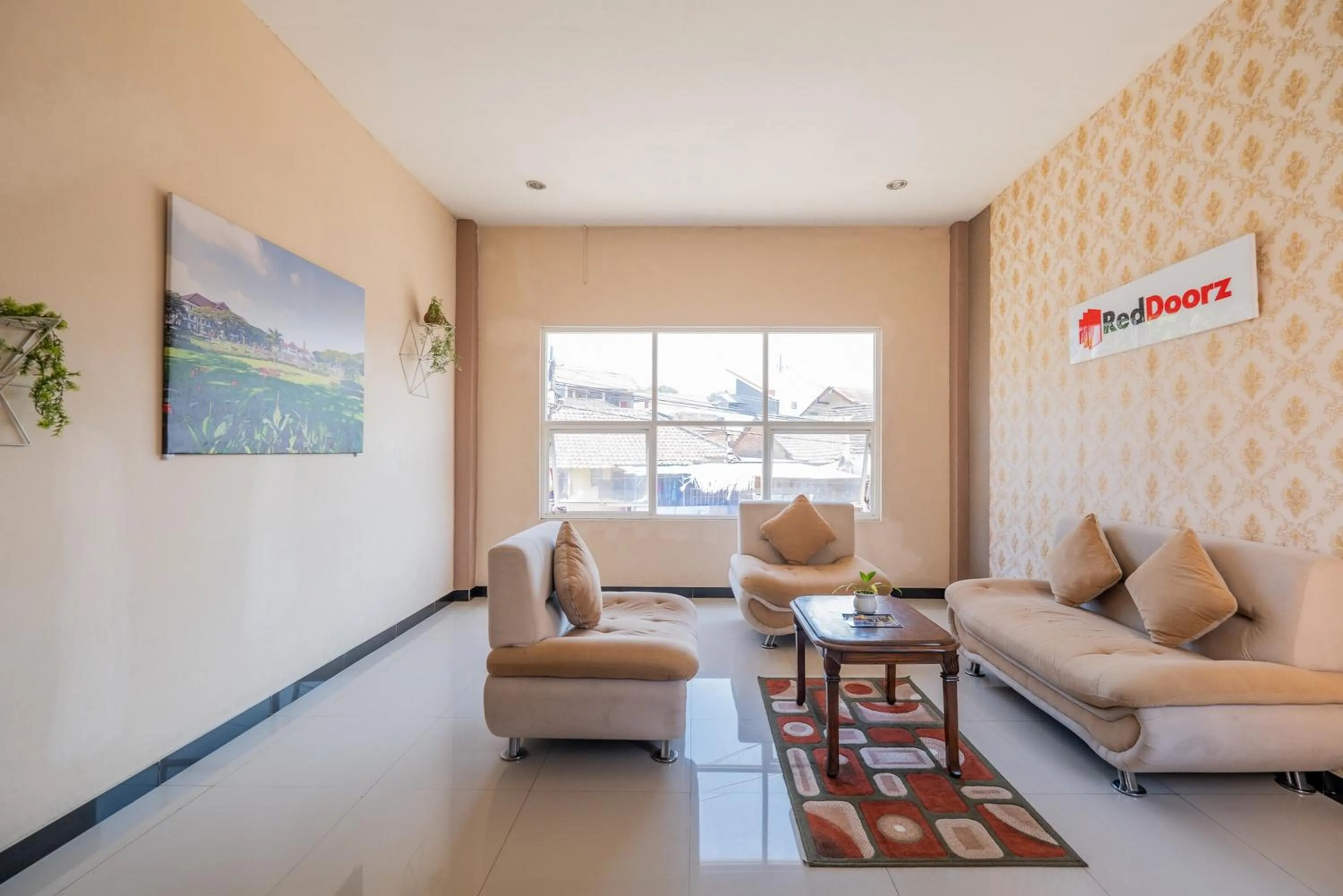 Seating area in RedDoorz Syariah near Batu Night Spectacular