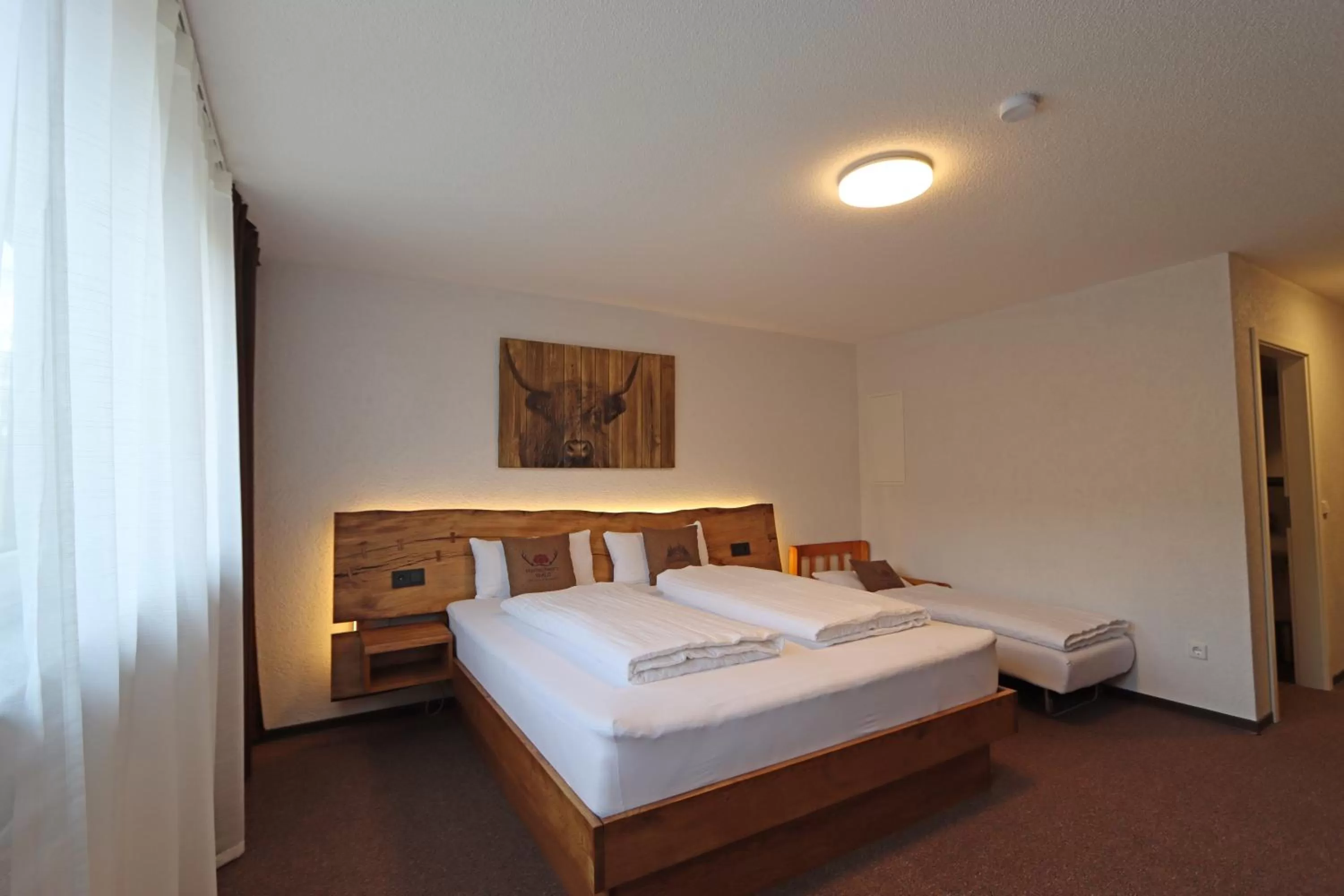 Bed in Hotel Kreuz Höhengasthof