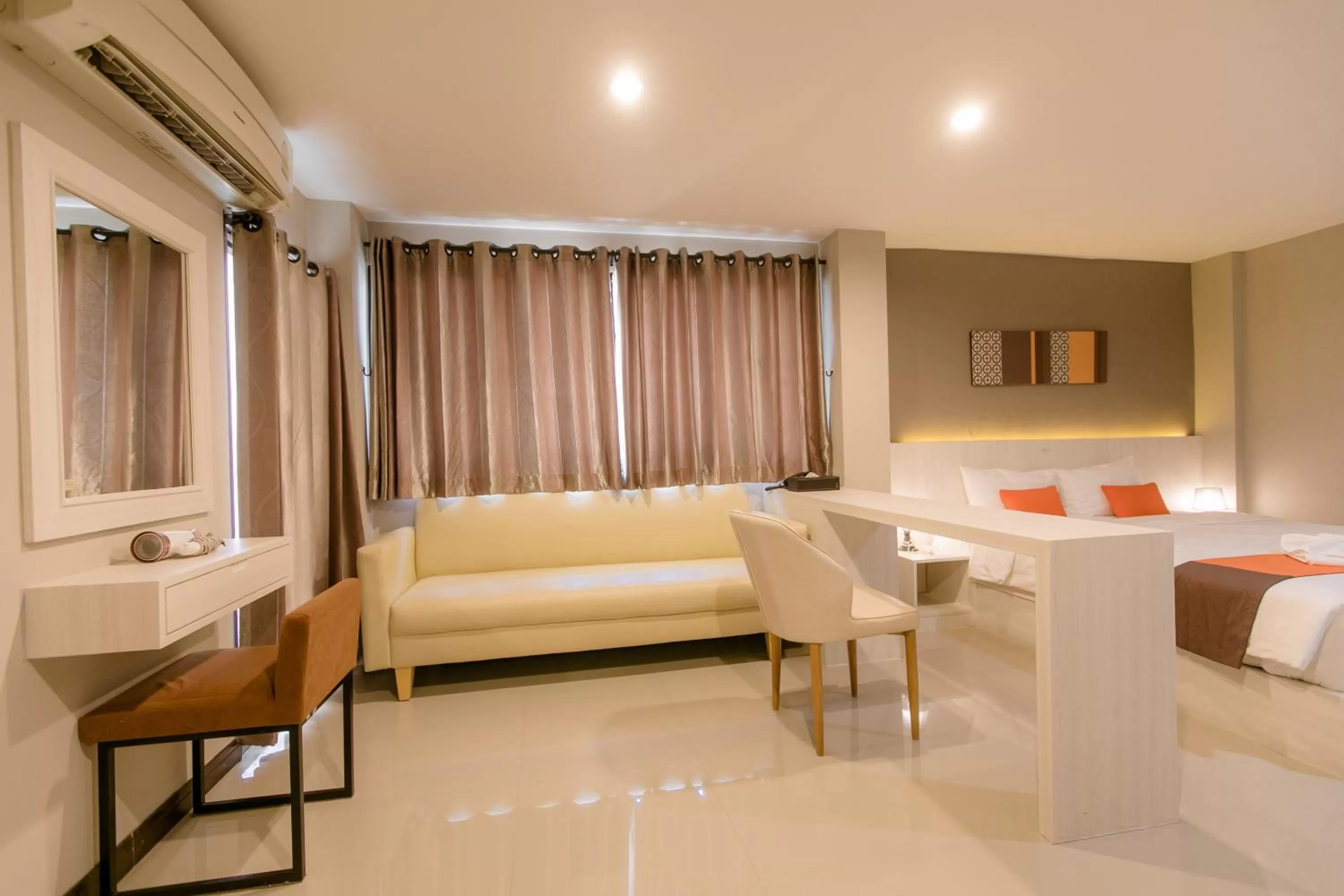 Bed in De Hug Hotel & Residence