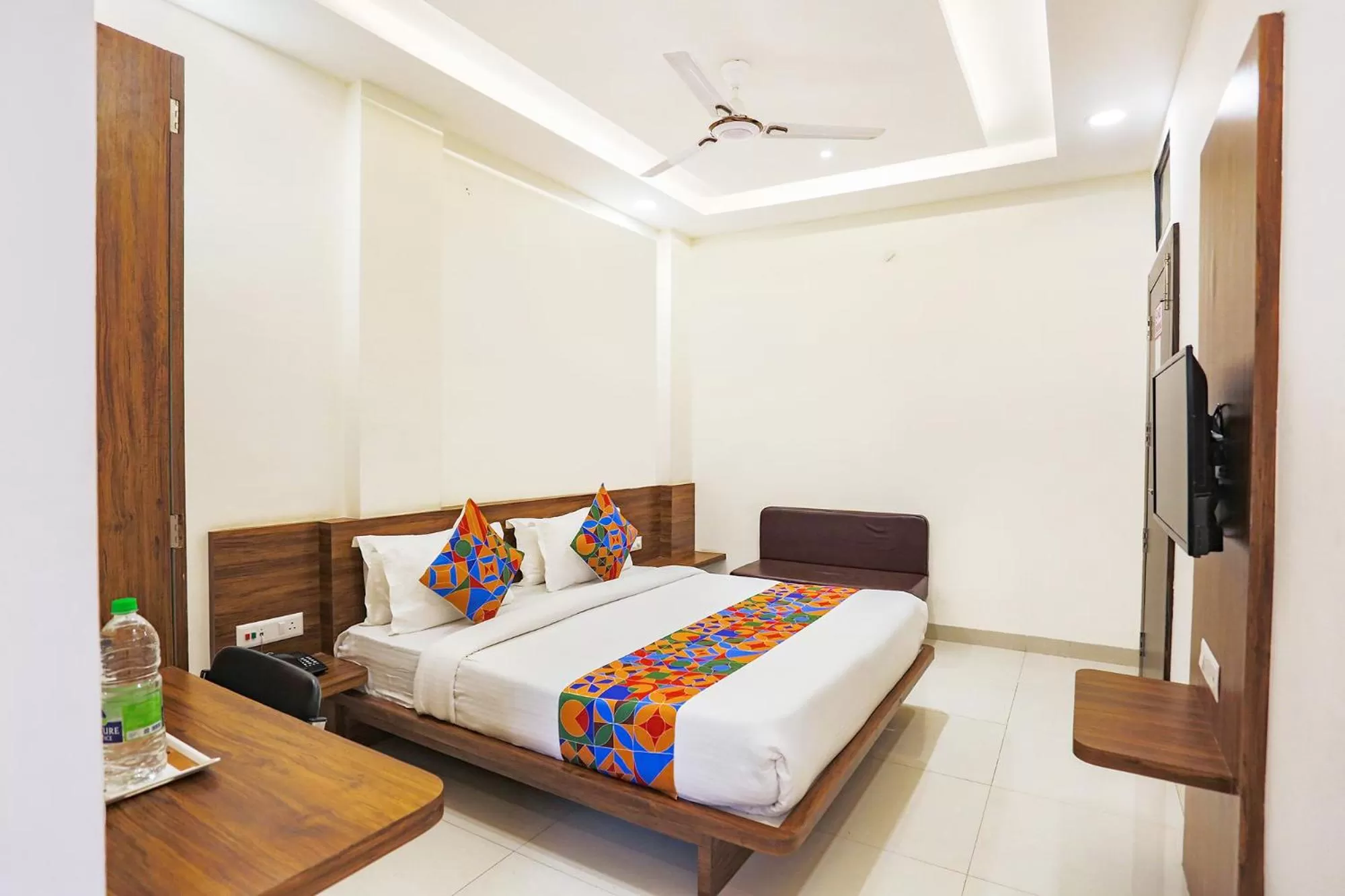 Bed in FabHotel Balaji Paradise