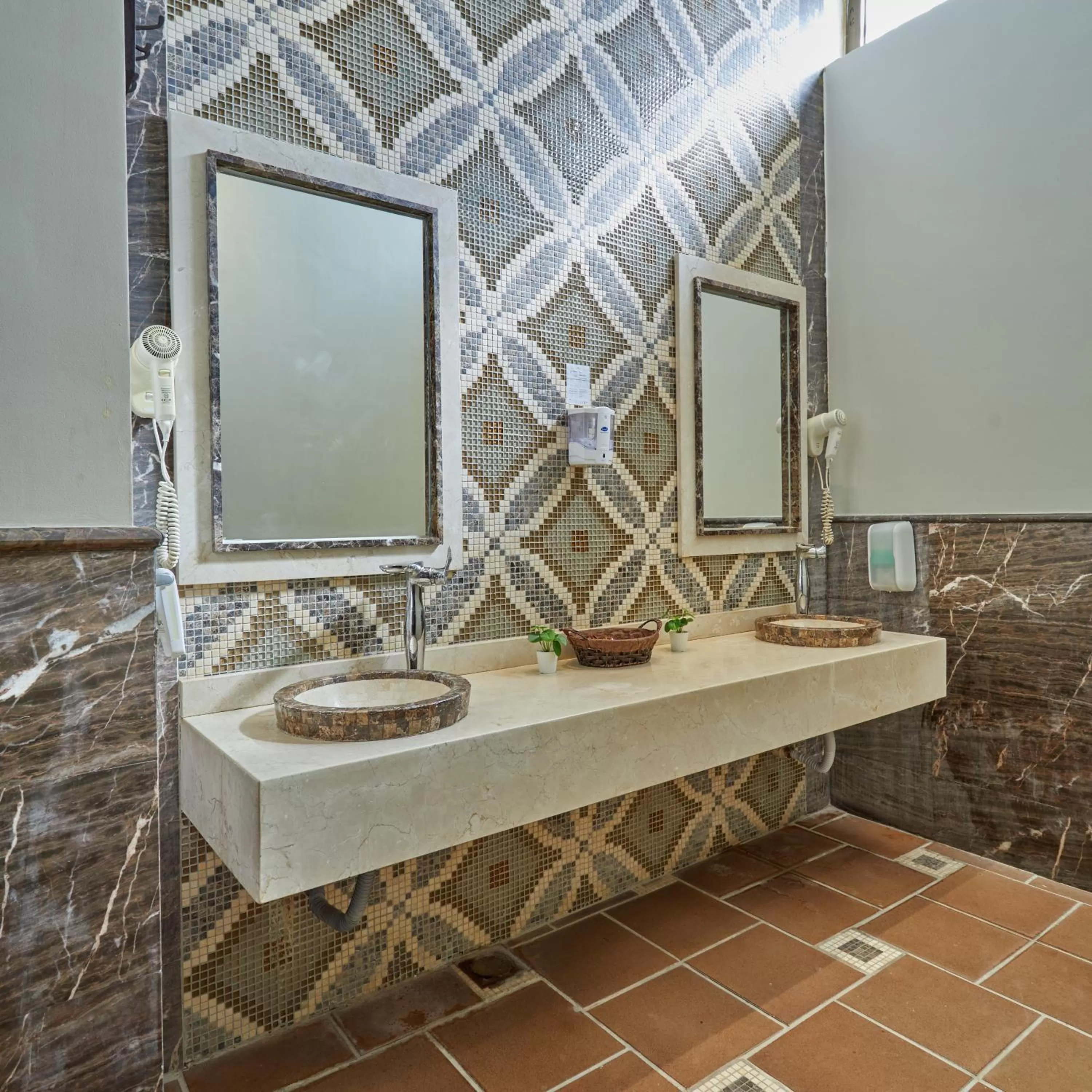 Bathroom in Crowne Plaza Riyadh Al Waha by IHG