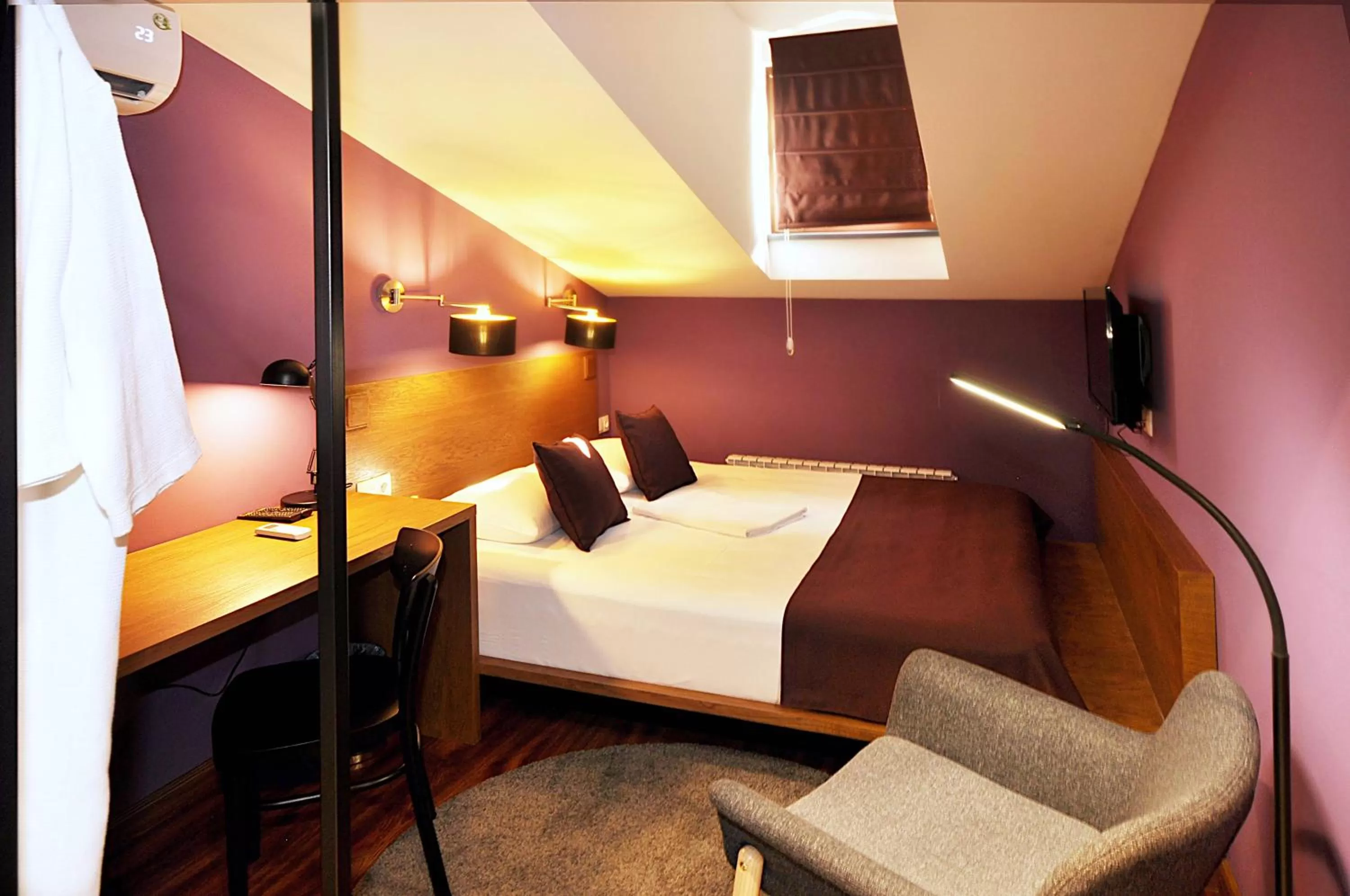 Bed in Elle Boutique Hotel