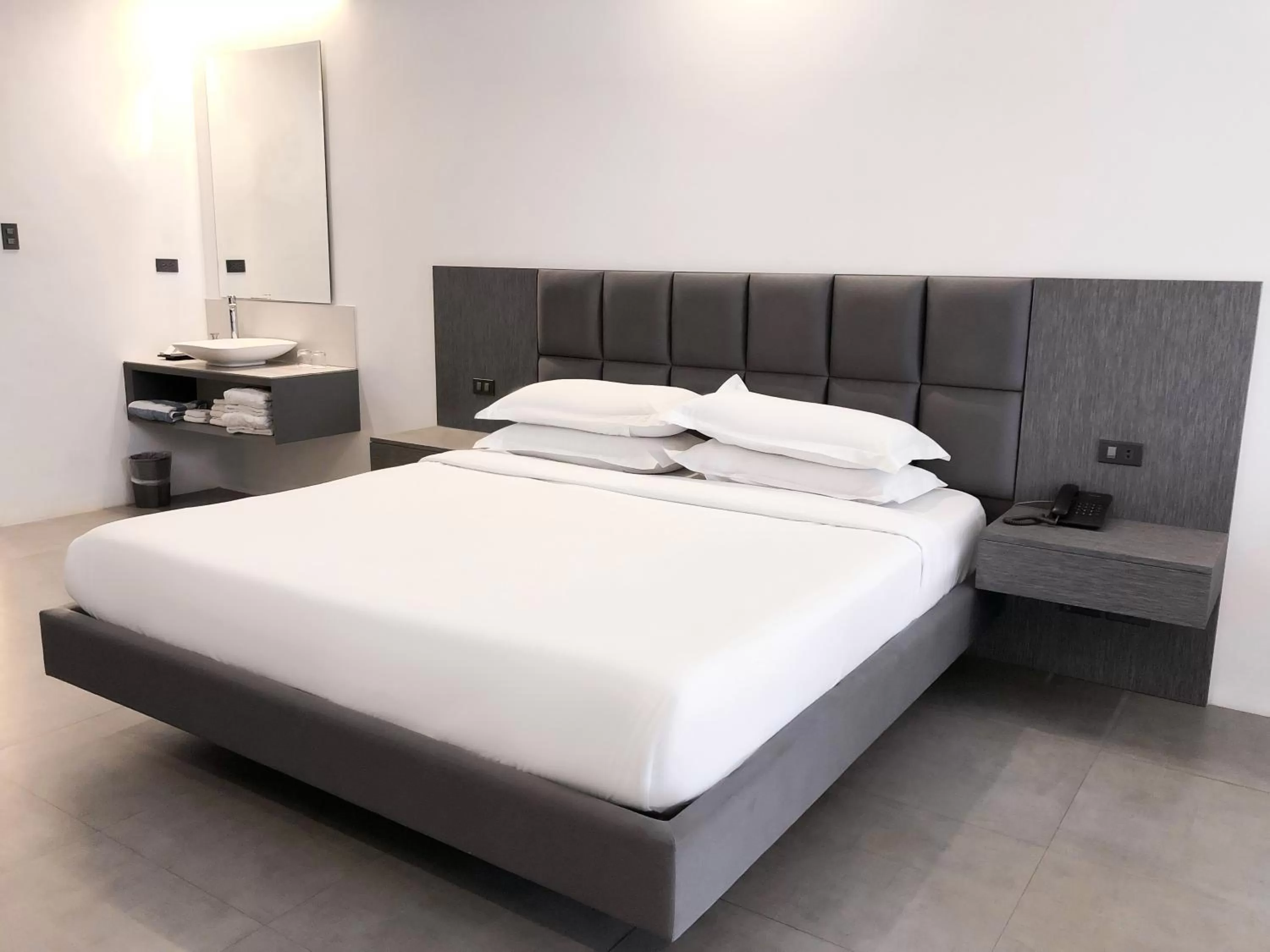 Bed in Winds Boutique Hotel