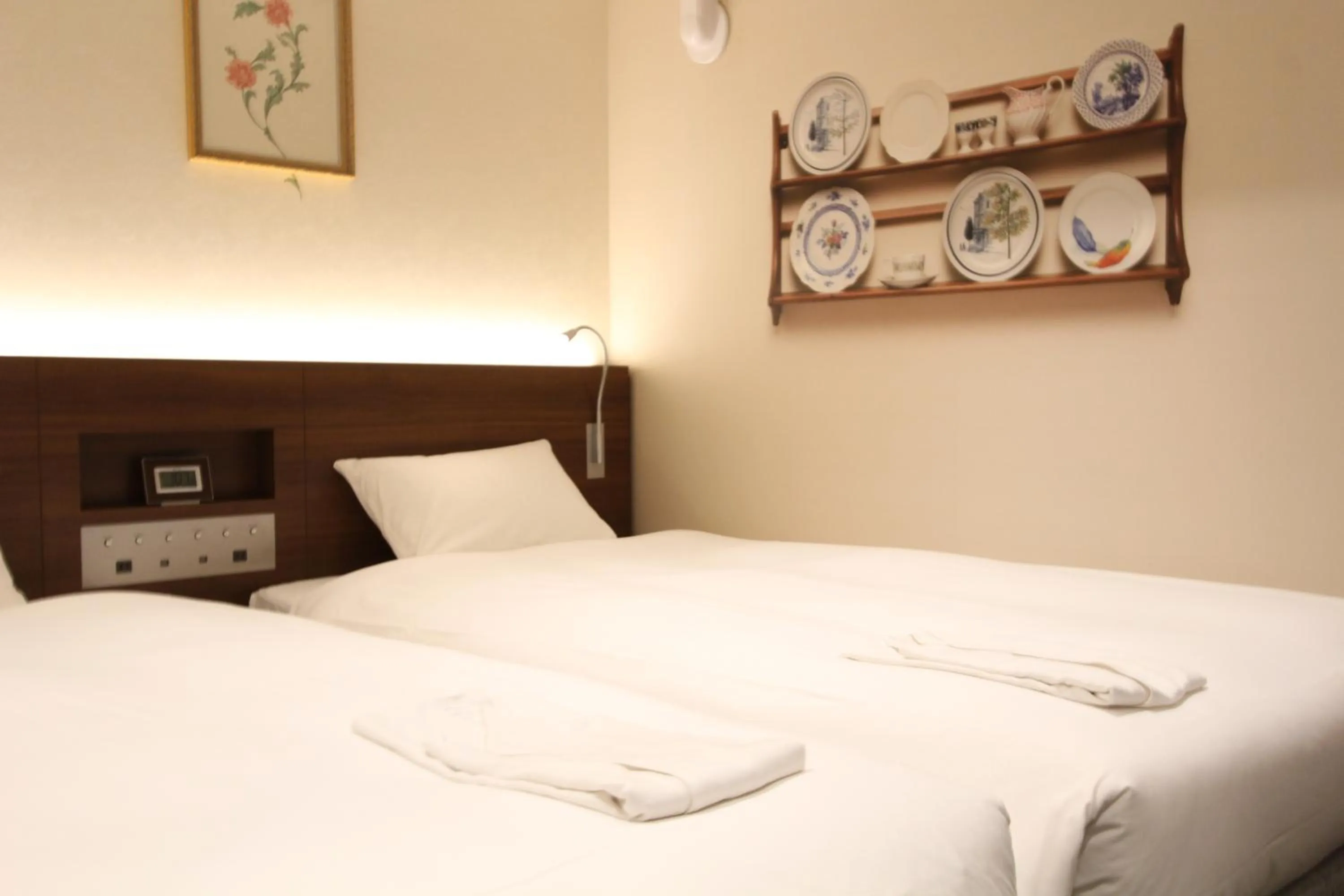 Bed in KOKO HOTEL Osaka Namba Ebisucho