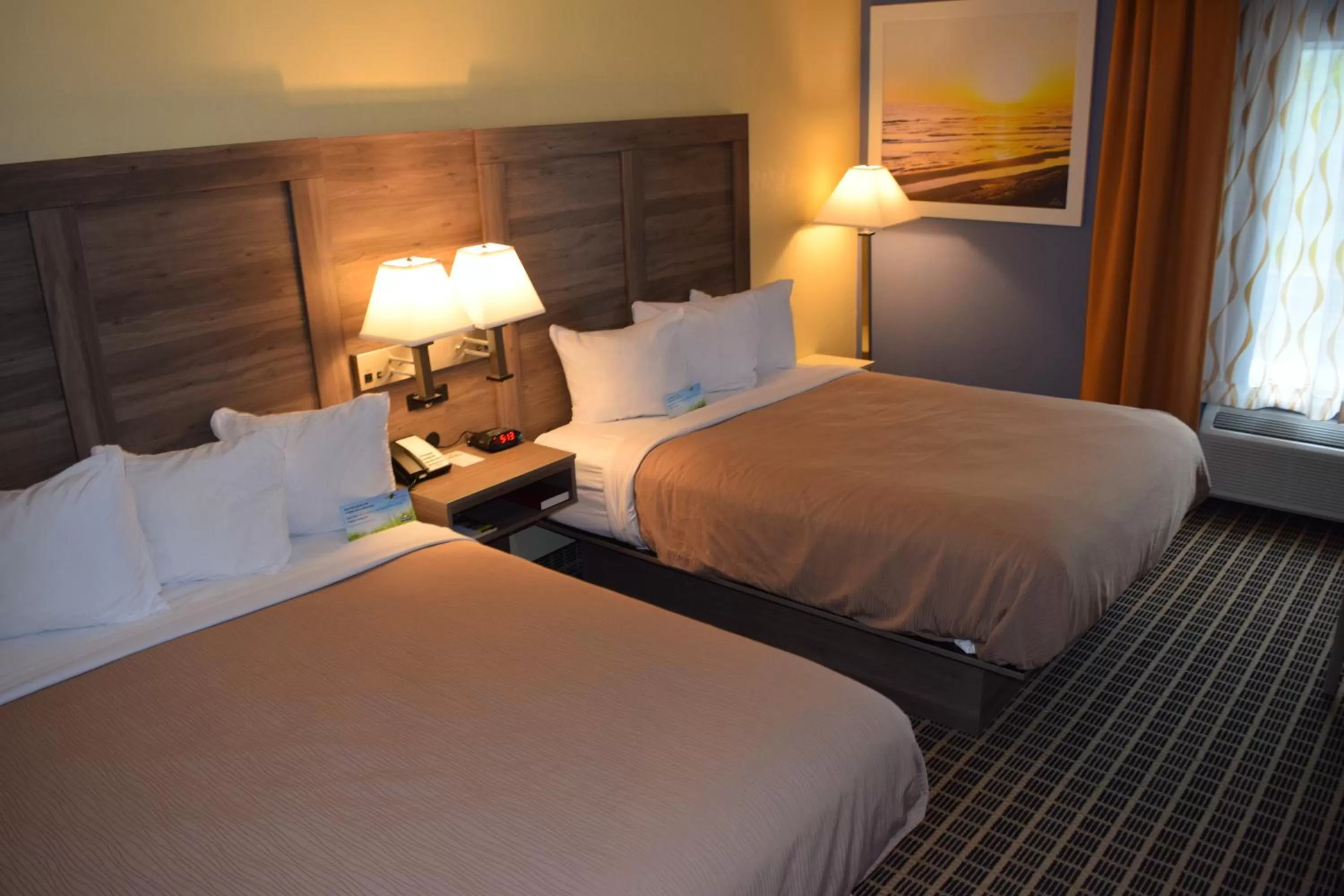Bed in Days Inn by Wyndham Cadillac